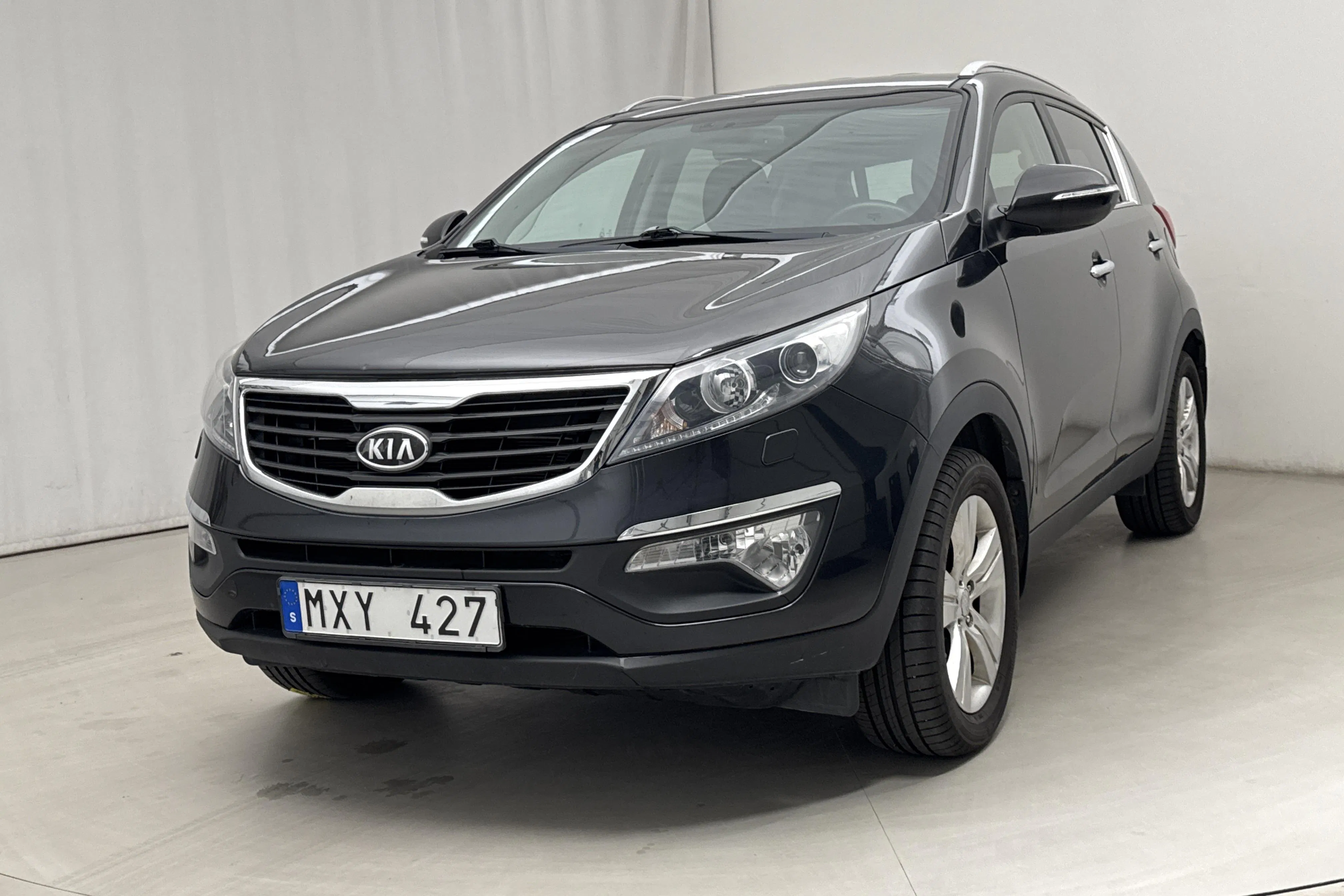 Presentationsfoto 1 av 13: KIA Sportage 1.6 2WD (136hk) - 12 029 mil - Manuell - svart - 2013