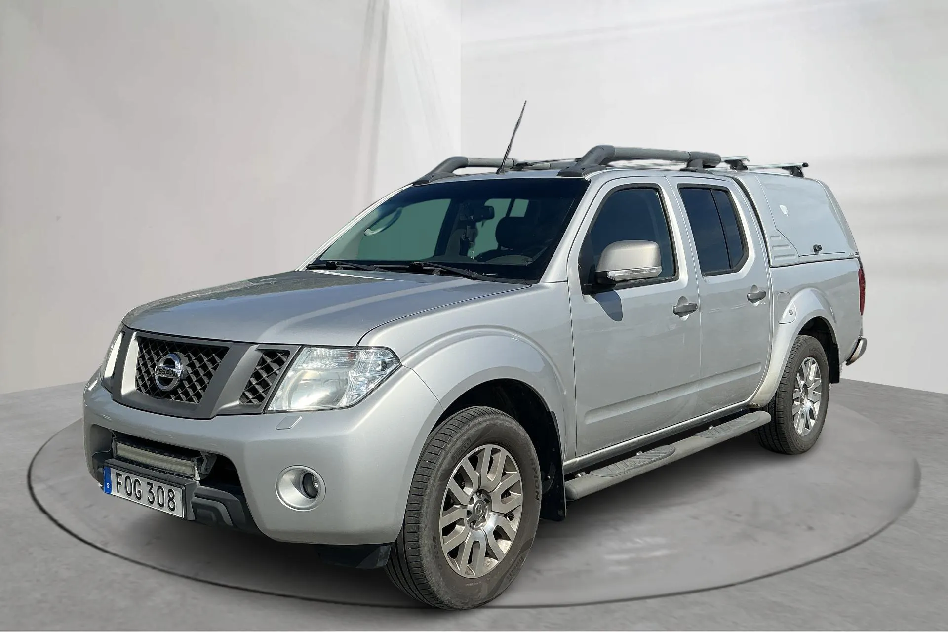 Zdjęcie prezentacyjne 1 z 14: Nissan Navara 2.5 dCi (190hk) - 181 680 km - Automatyczna - srebro - 2015