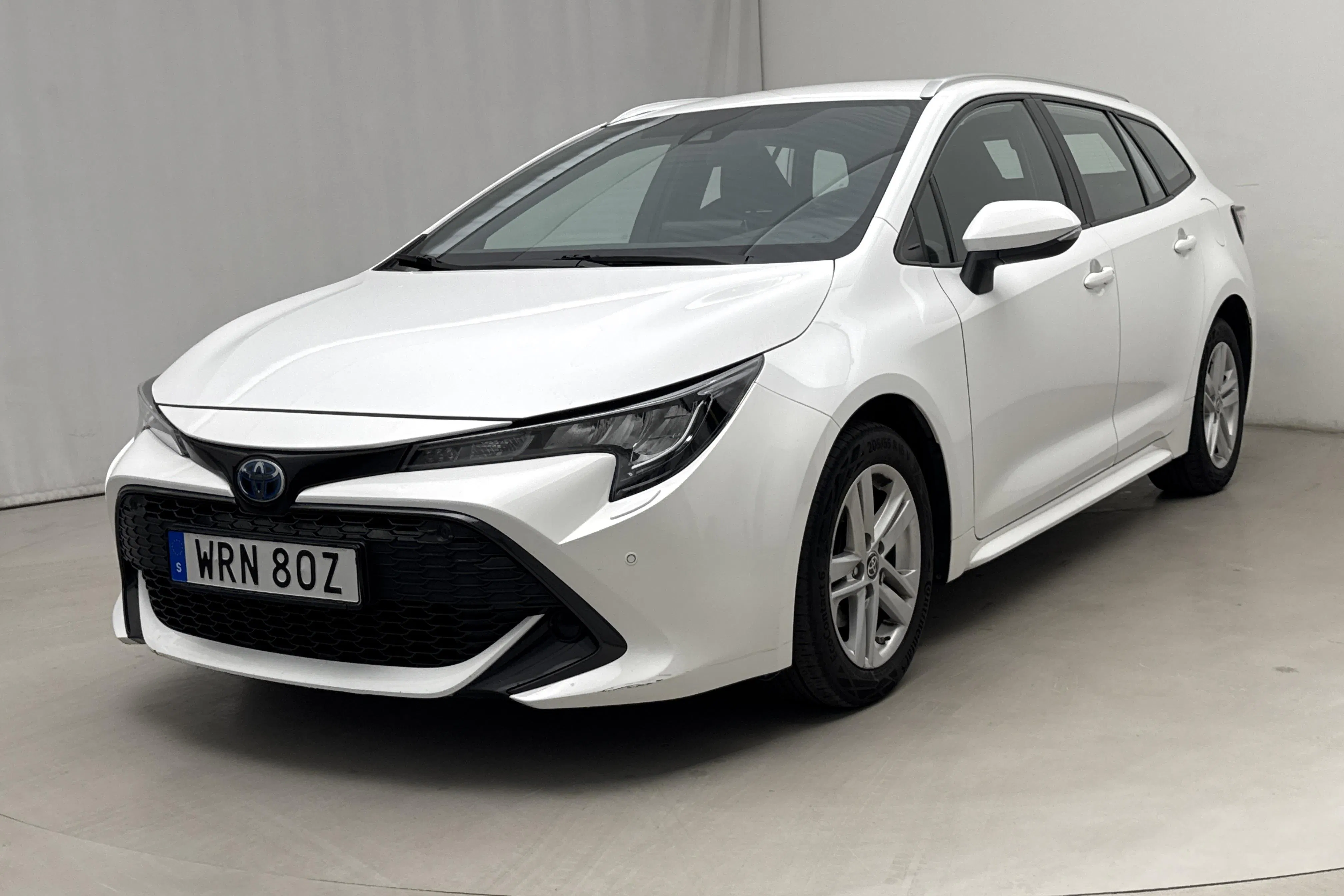 Presentationsfoto 1 av 15: Toyota Corolla 1.8 Hybrid Touring Sports (122hk) - 7 328 mil - Automat - vit - 2022