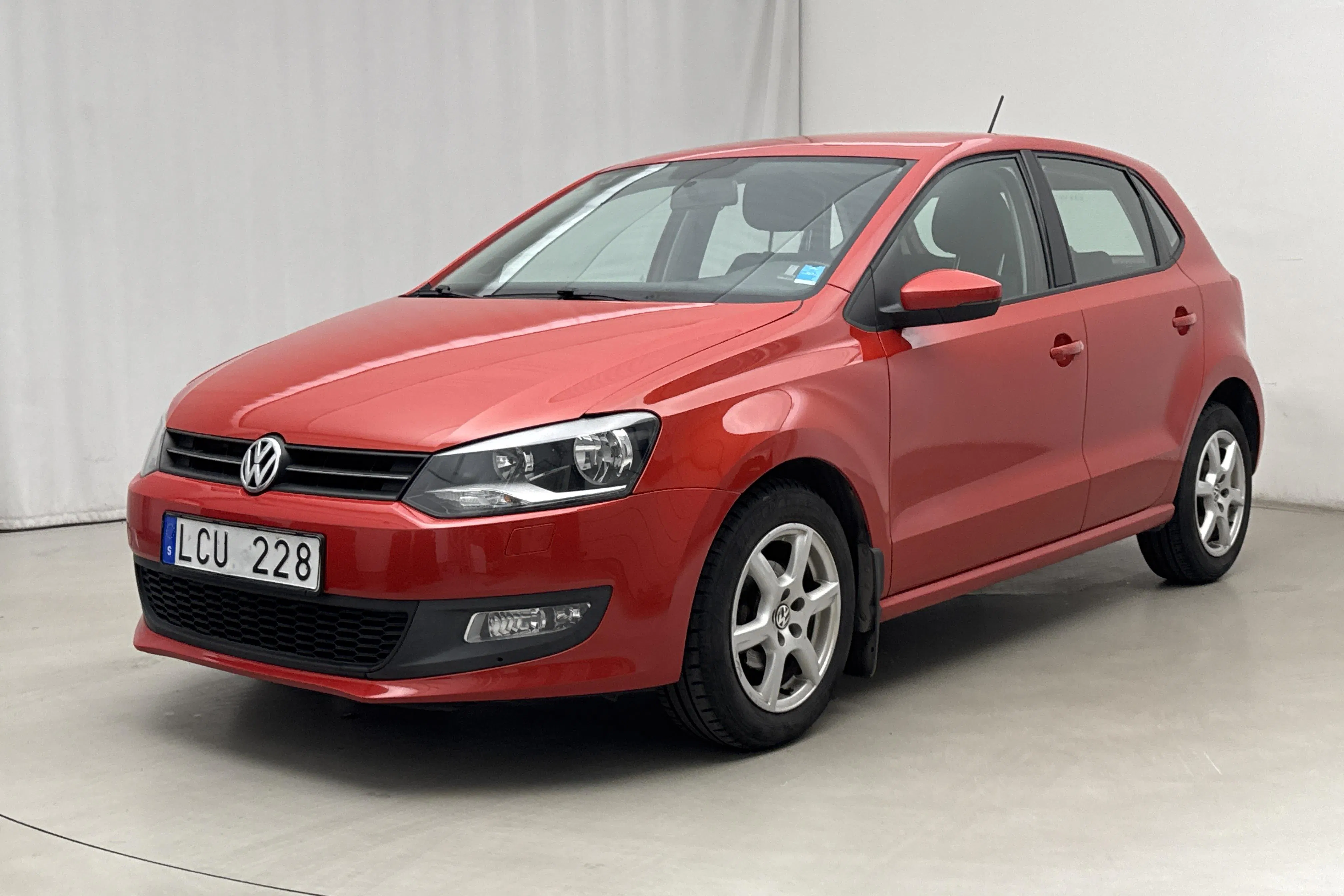 Presentation photo 1 of 14: VW Polo 1.4 5dr (85hk) - 93 530 km - Manual - orange - 2011
