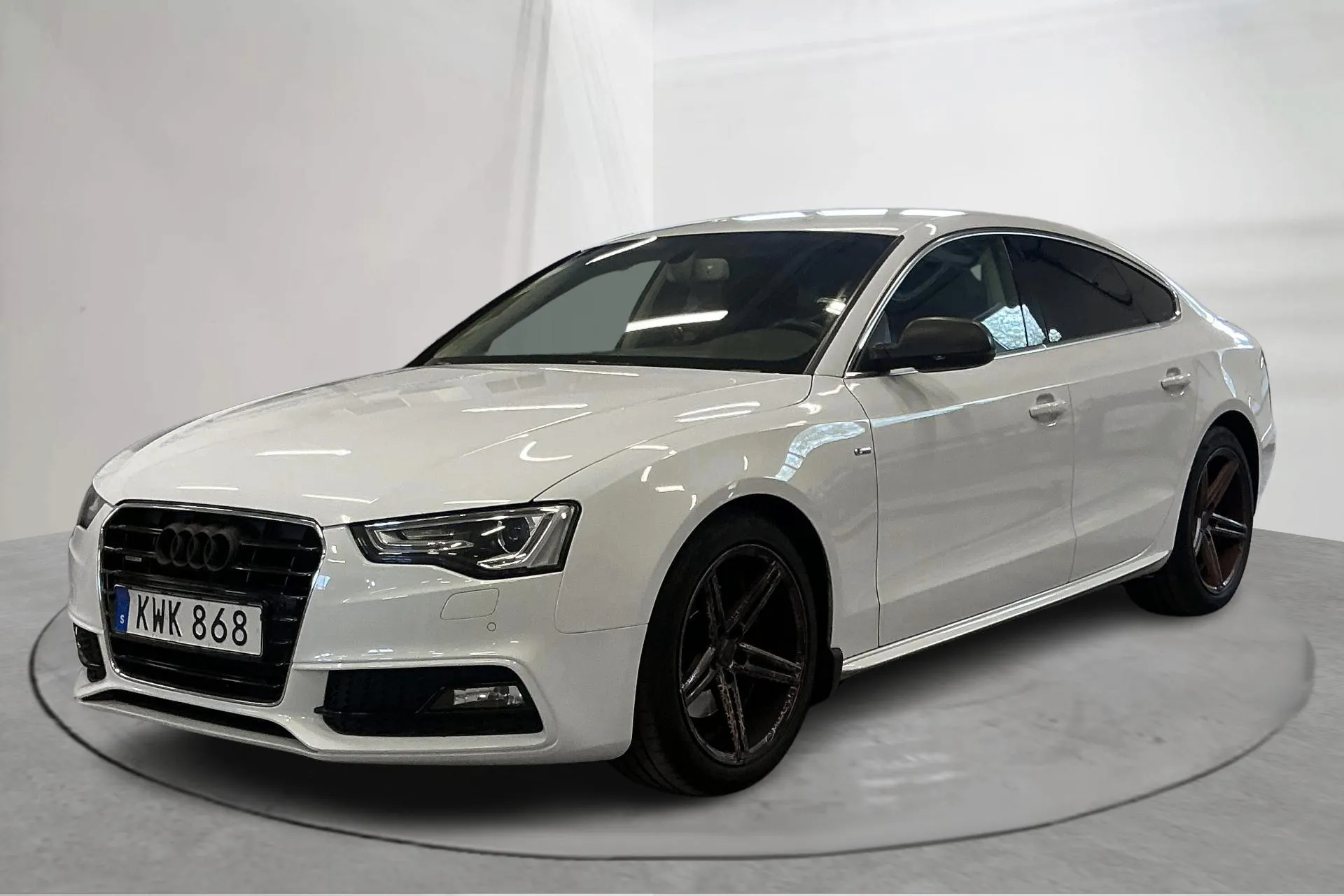 Presentation photo 1 of 18: Audi A5 2.0 TDI Clean diesel Sportback quattro (190hk) - 191 310 km - Automatic - white - 2015