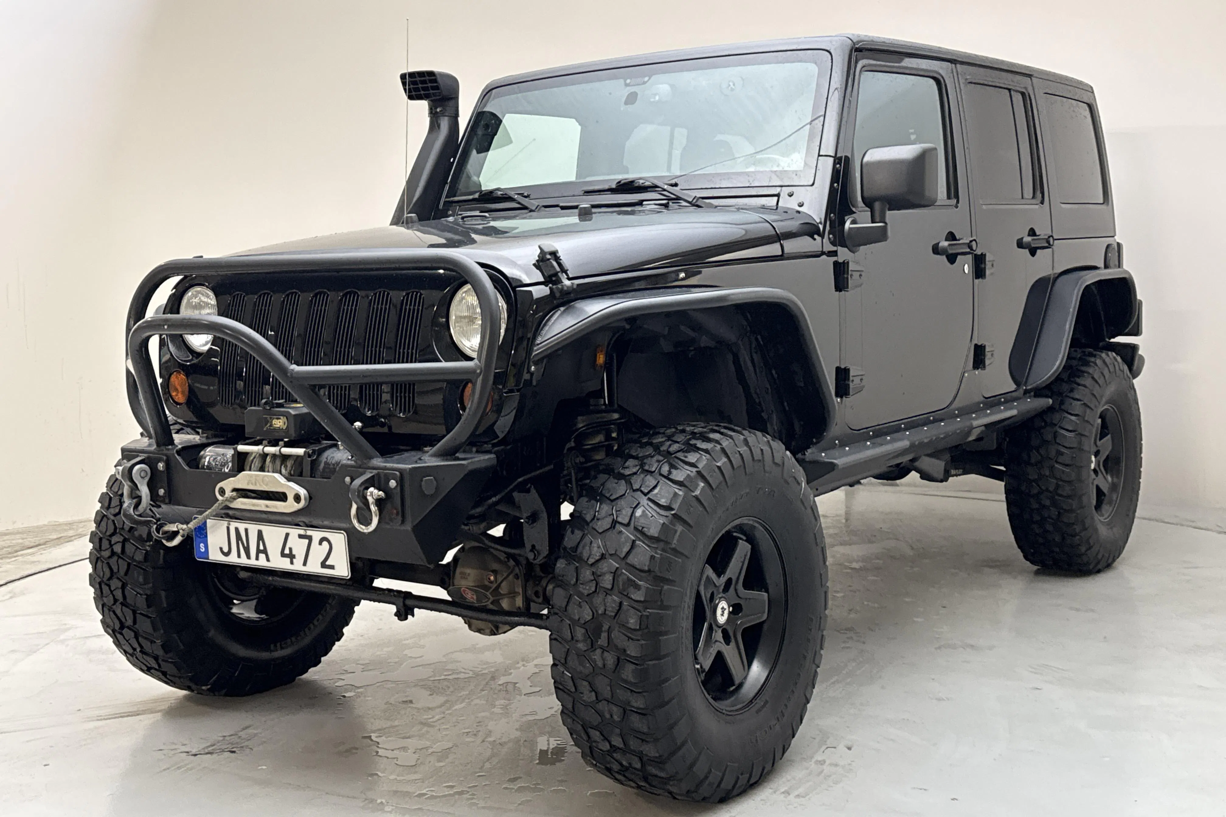 Presentationsfoto 1 av 14: Jeep Wrangler Unlimited 2.8 CRD 4dr (200hk) - 8 665 mil - Automat - svart - 2013