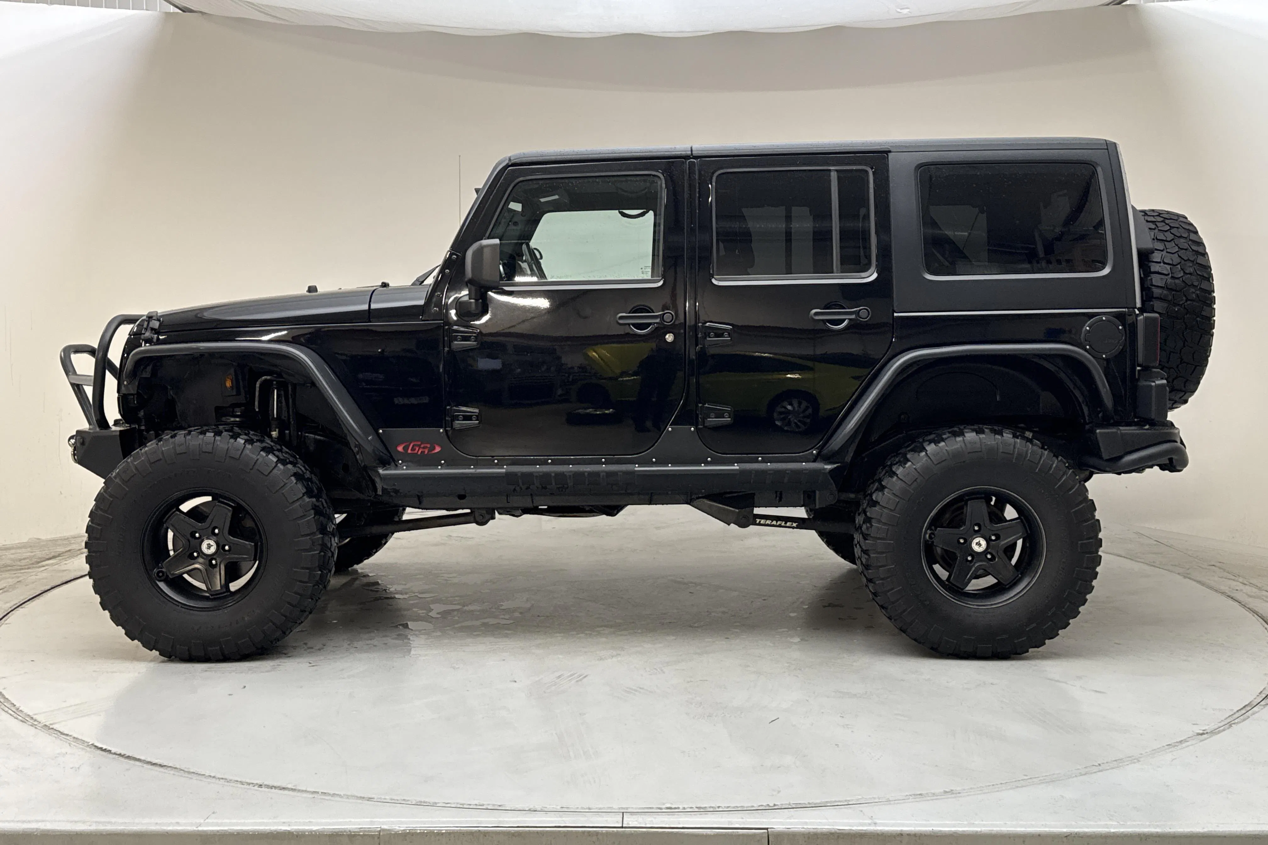 Presentationsfoto 2 av 14: Jeep Wrangler Unlimited 2.8 CRD 4dr (200hk) - 8 665 mil - Automat - svart - 2013