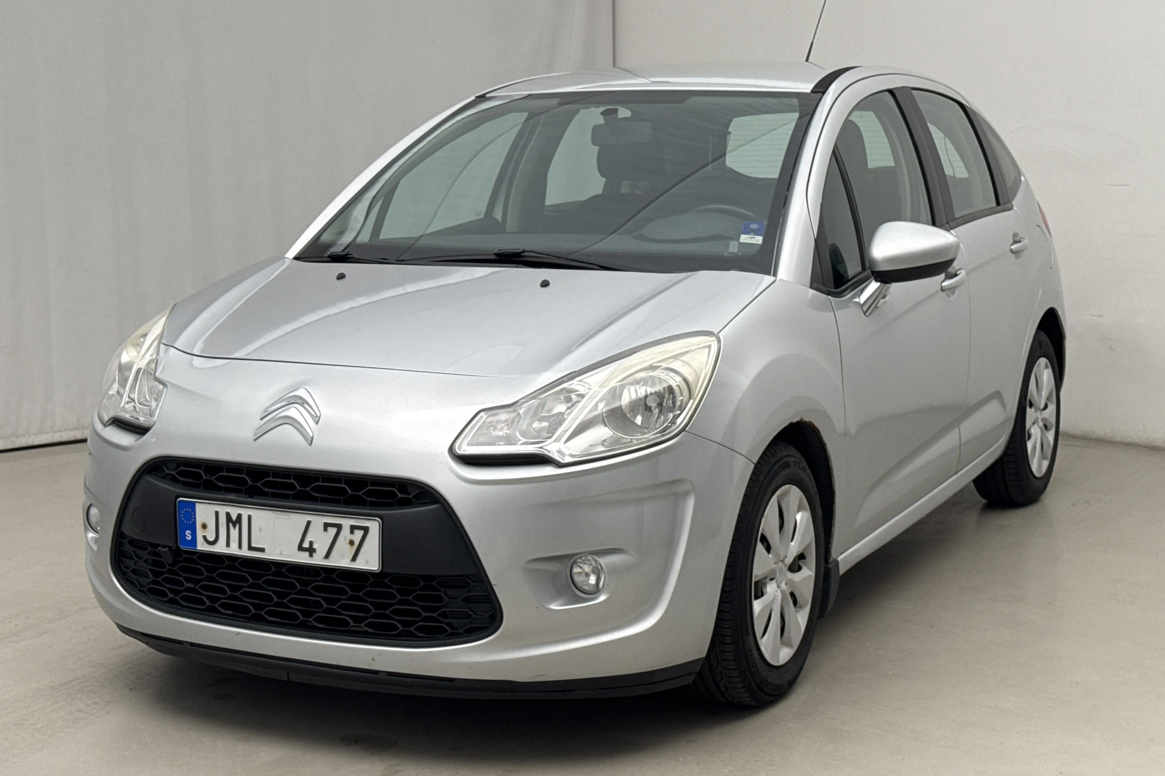 Presentation photo 1 of 14: Citroën C3 1.4 VTi  (95hk) - 143 510 km - Manual - silver - 2010