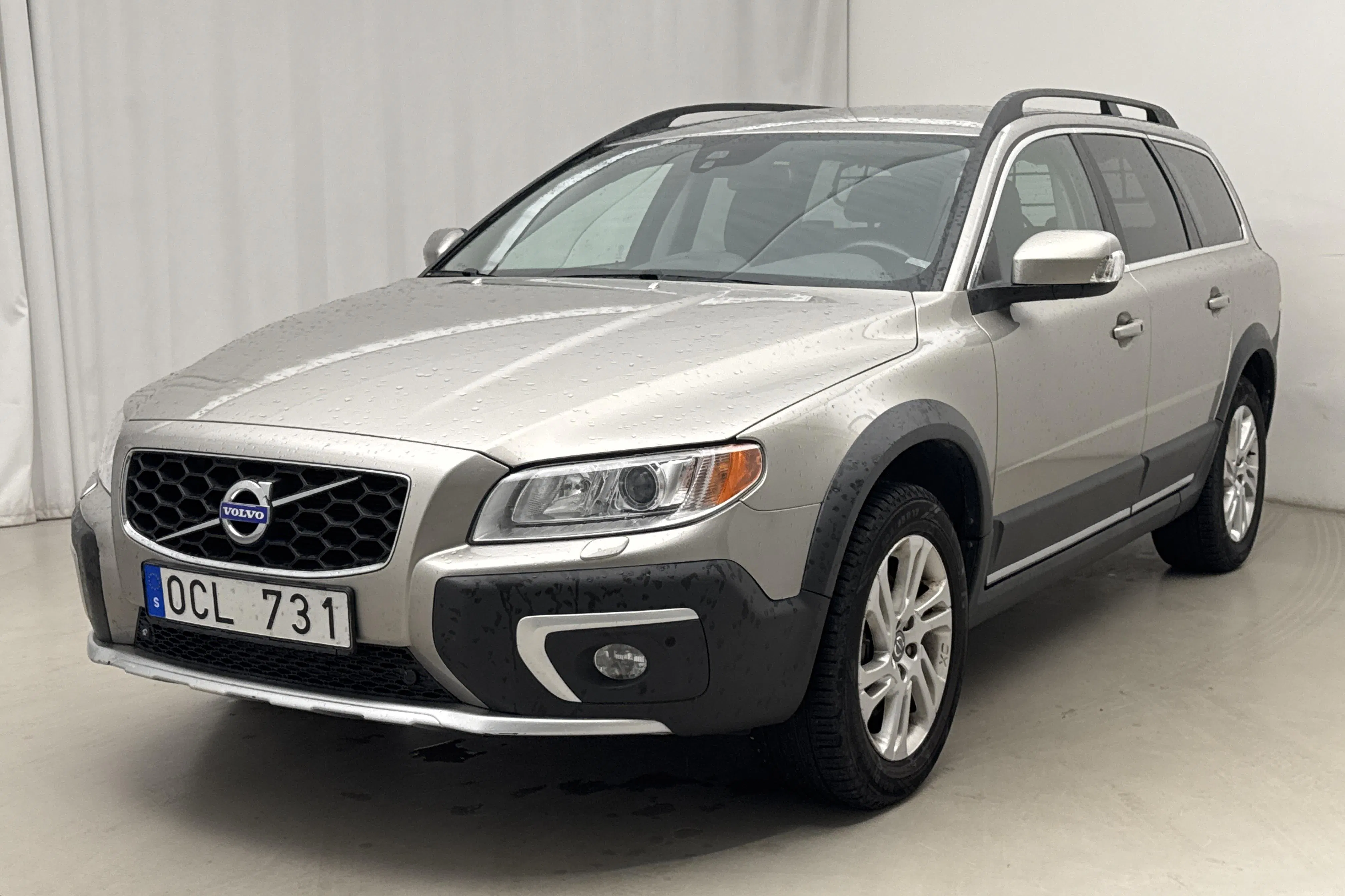 Presentation photo 1 of 16: Volvo XC70 II D4 AWD (215hk) - 118 340 km - Automatic - light brown - 2014