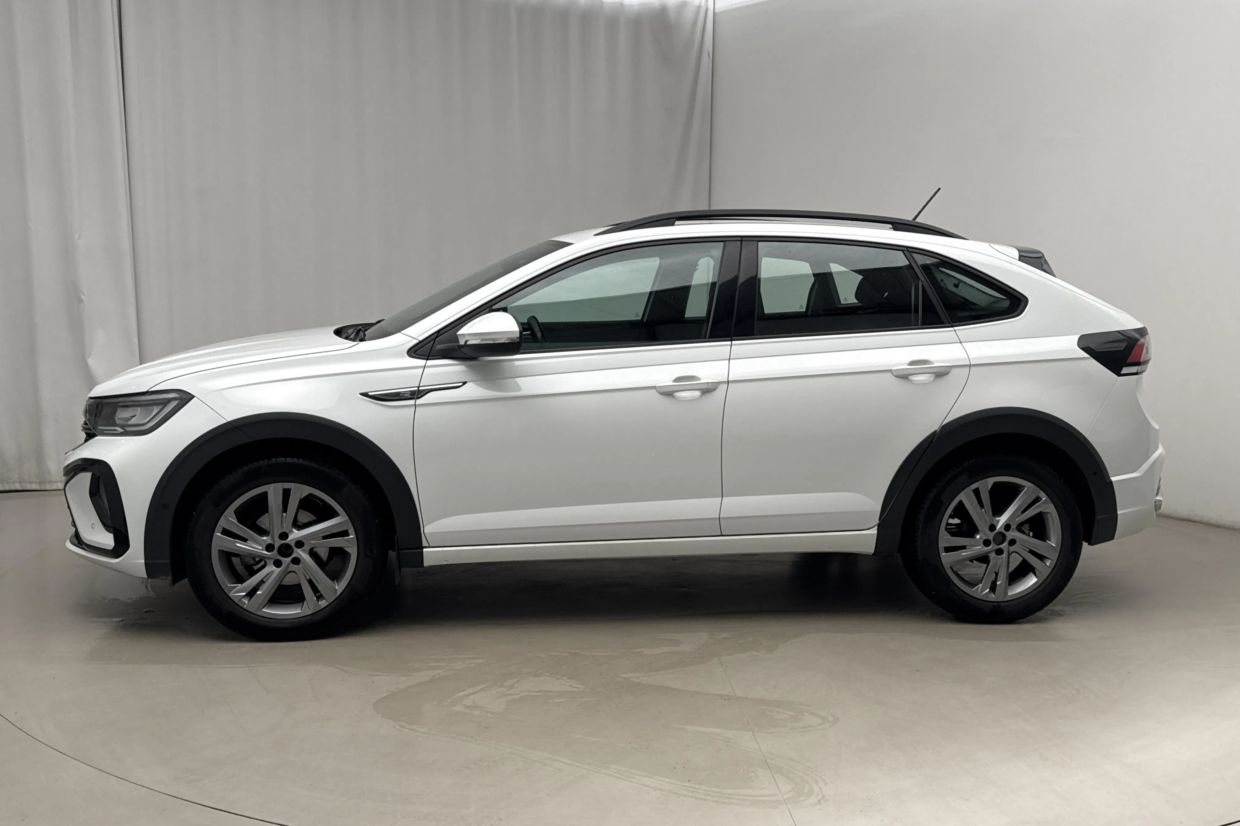Presentationsfoto 2 av 14: VW Taigo 1.0 TSI (110hk) - 6 415 mil - Automat - vit - 2023