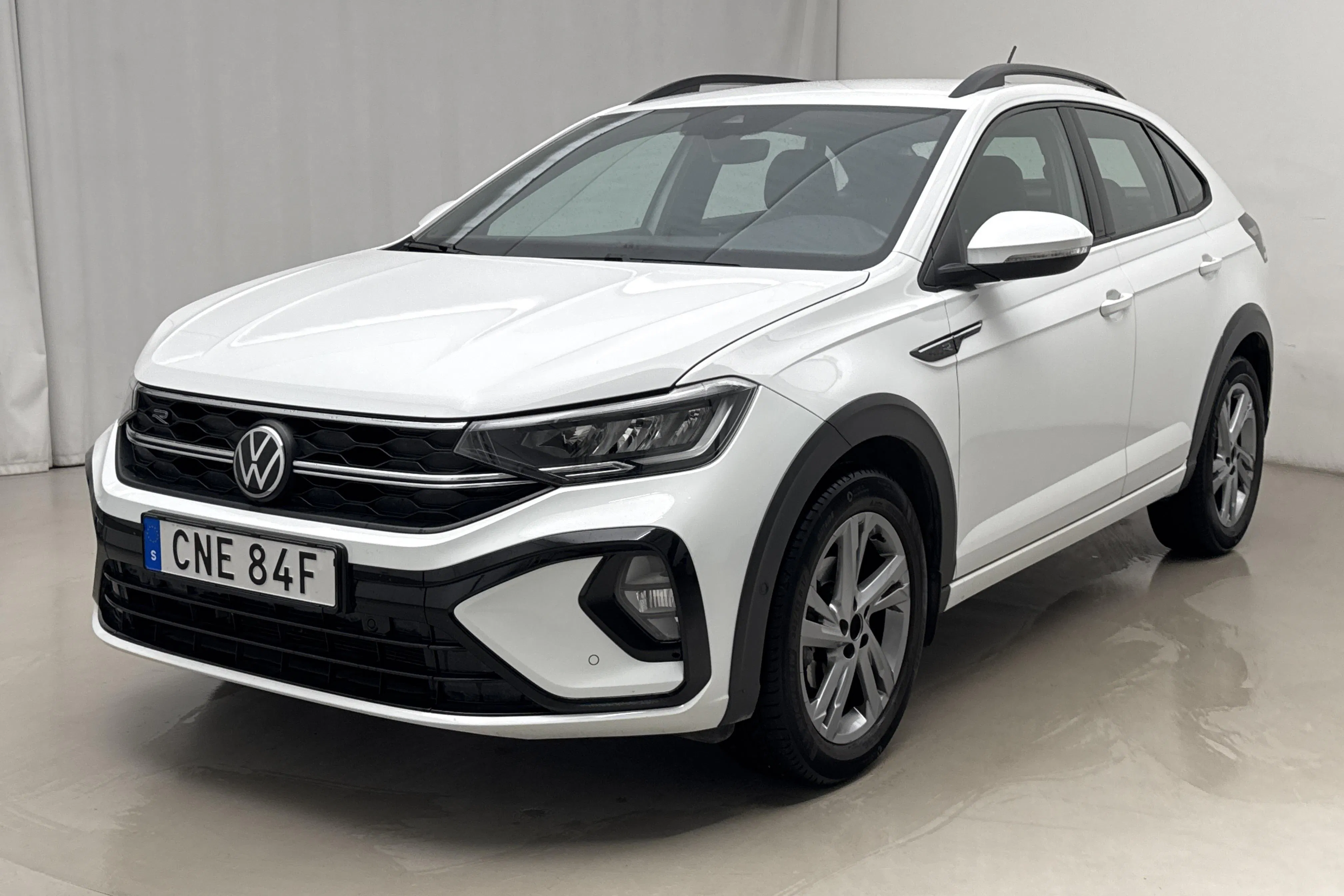 Presentationsfoto 1 av 14: VW Taigo 1.0 TSI (110hk) - 6 415 mil - Automat - vit - 2023