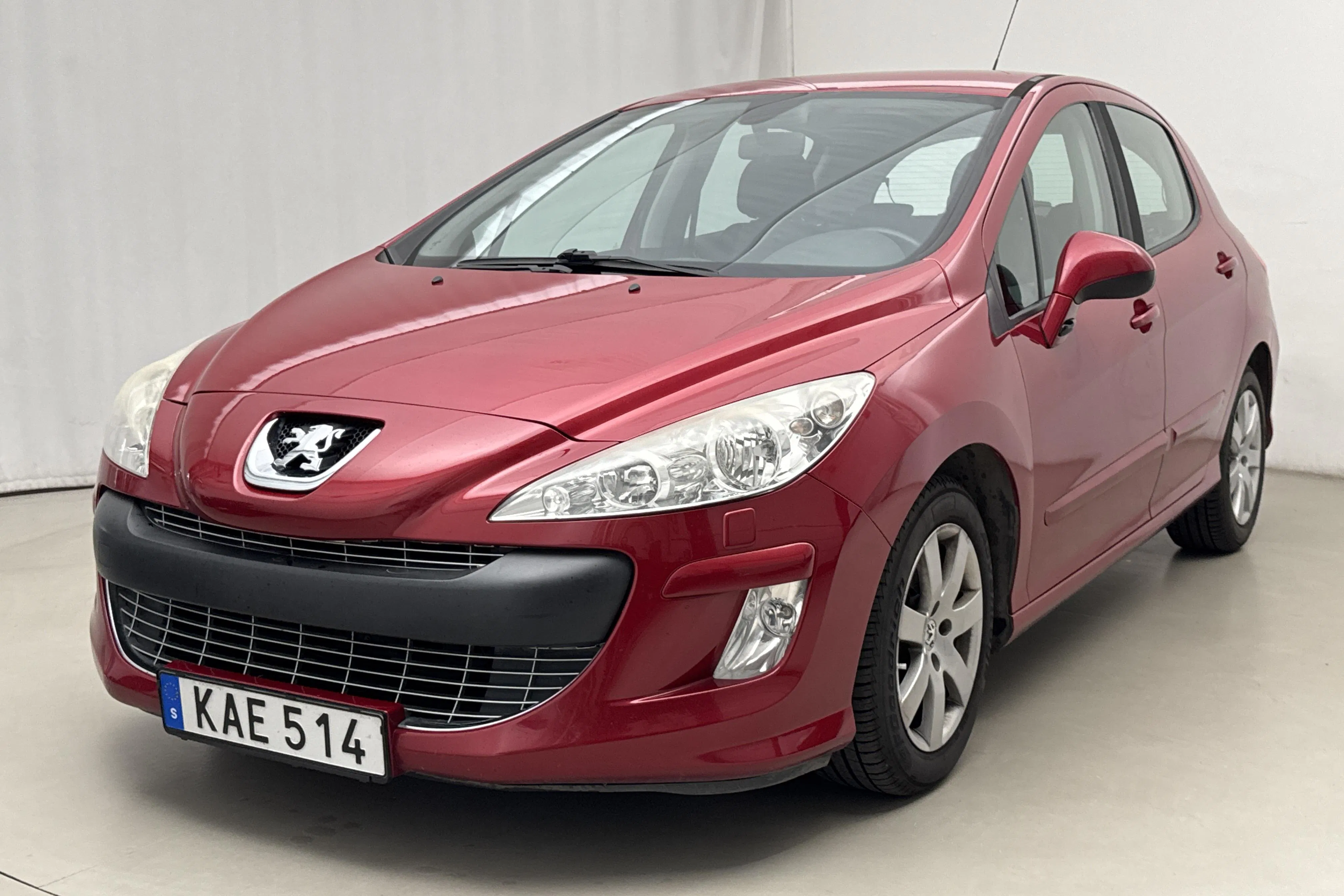 Presentationsfoto 1 av 15: Peugeot 308 1.6 Turbo 5dr (150hk) - 14 260 mil - Manuell - röd - 2009