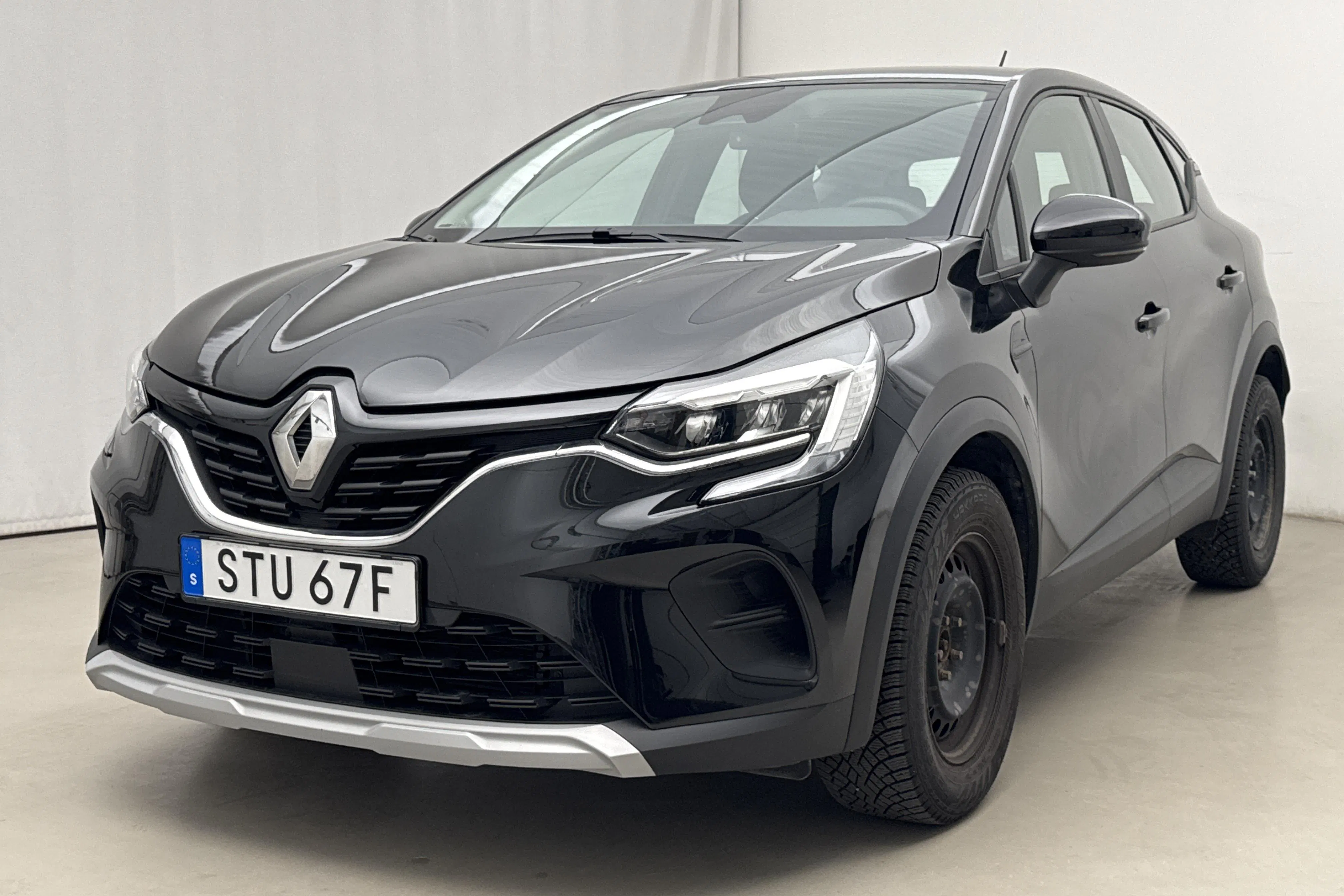 Presentationsfoto 1 av 15: Renault Captur 1.3 TCe (140hk) - 2 128 mil - Automat - svart - 2023