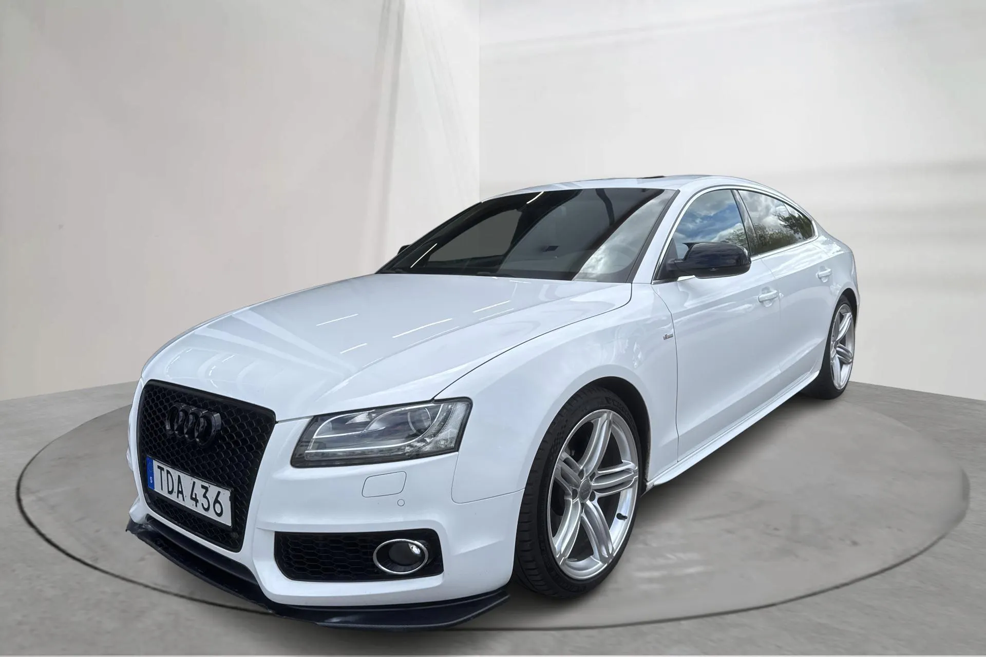 Presentation photo 1 of 16: Audi A5 2.0 TFSI Sportback quattro (211hk) - 180 320 km - Automatic - white - 2010