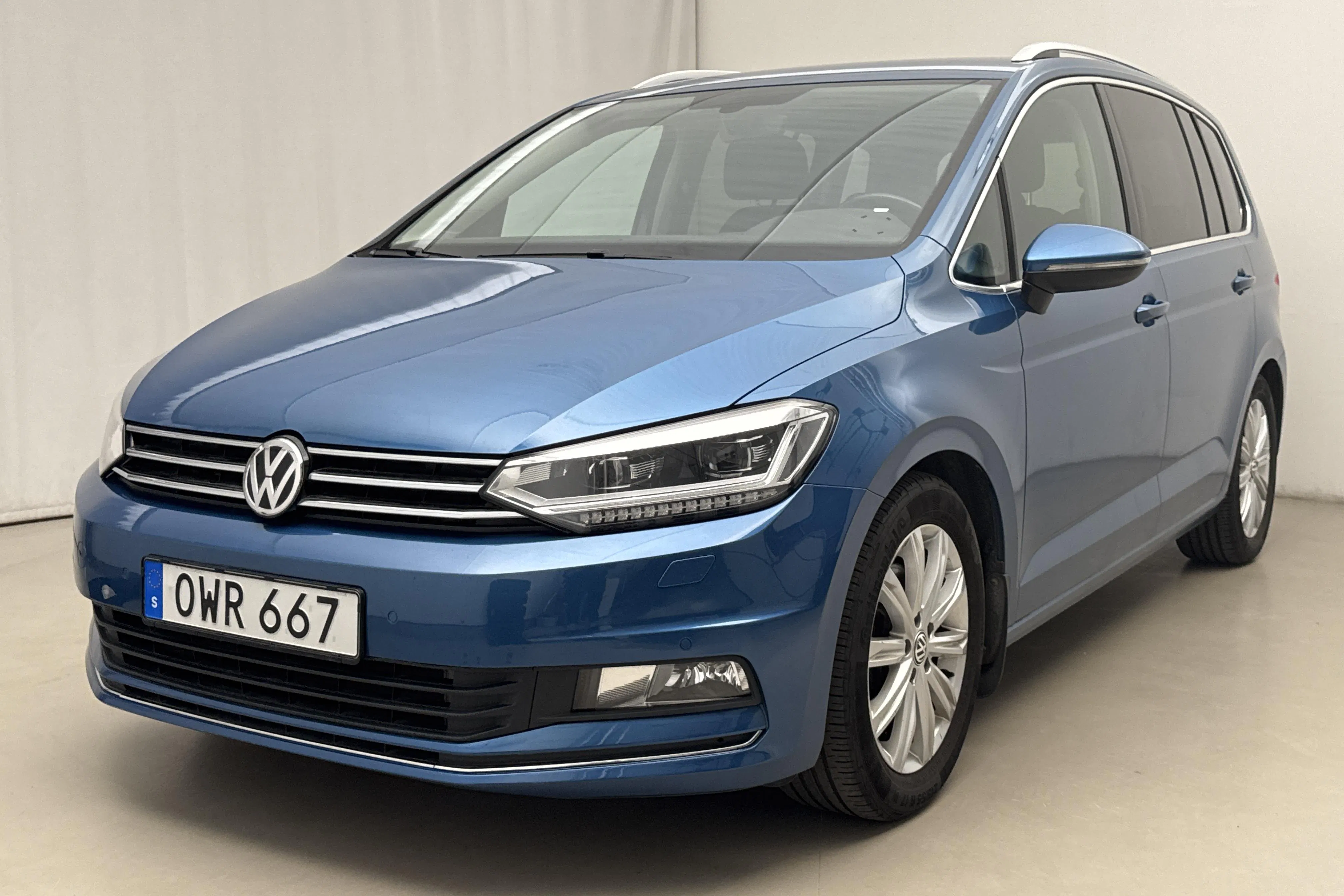 Presentationsfoto 1 av 30: VW Touran 1.8 TSI (180hk) - 8 519 mil - Automat - blå - 2016