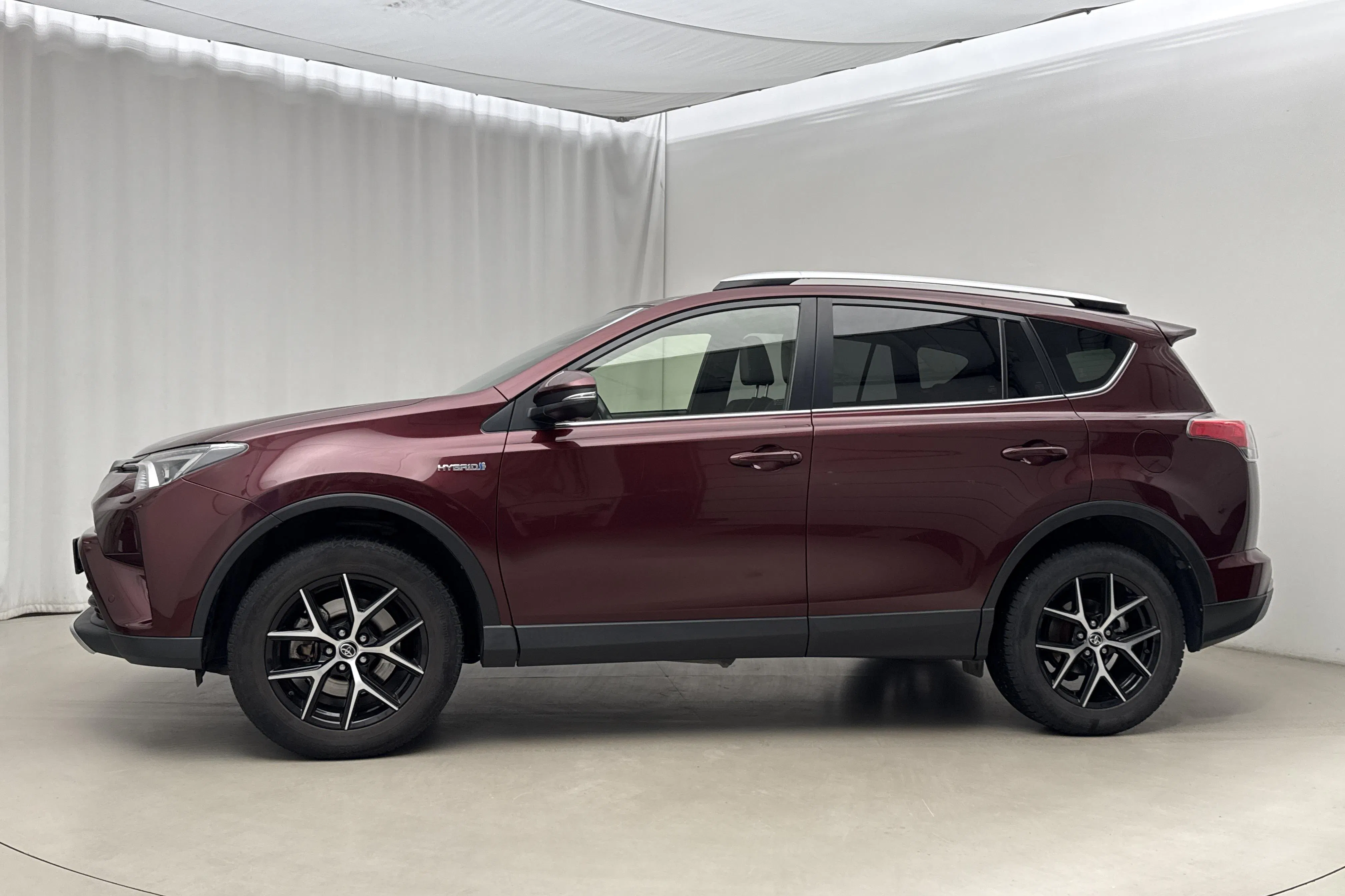 Presentation photo 2 of 17: Toyota RAV4 2.5 HSD AWD (197hk) - 147 670 km - Automatic - dark red - 2016