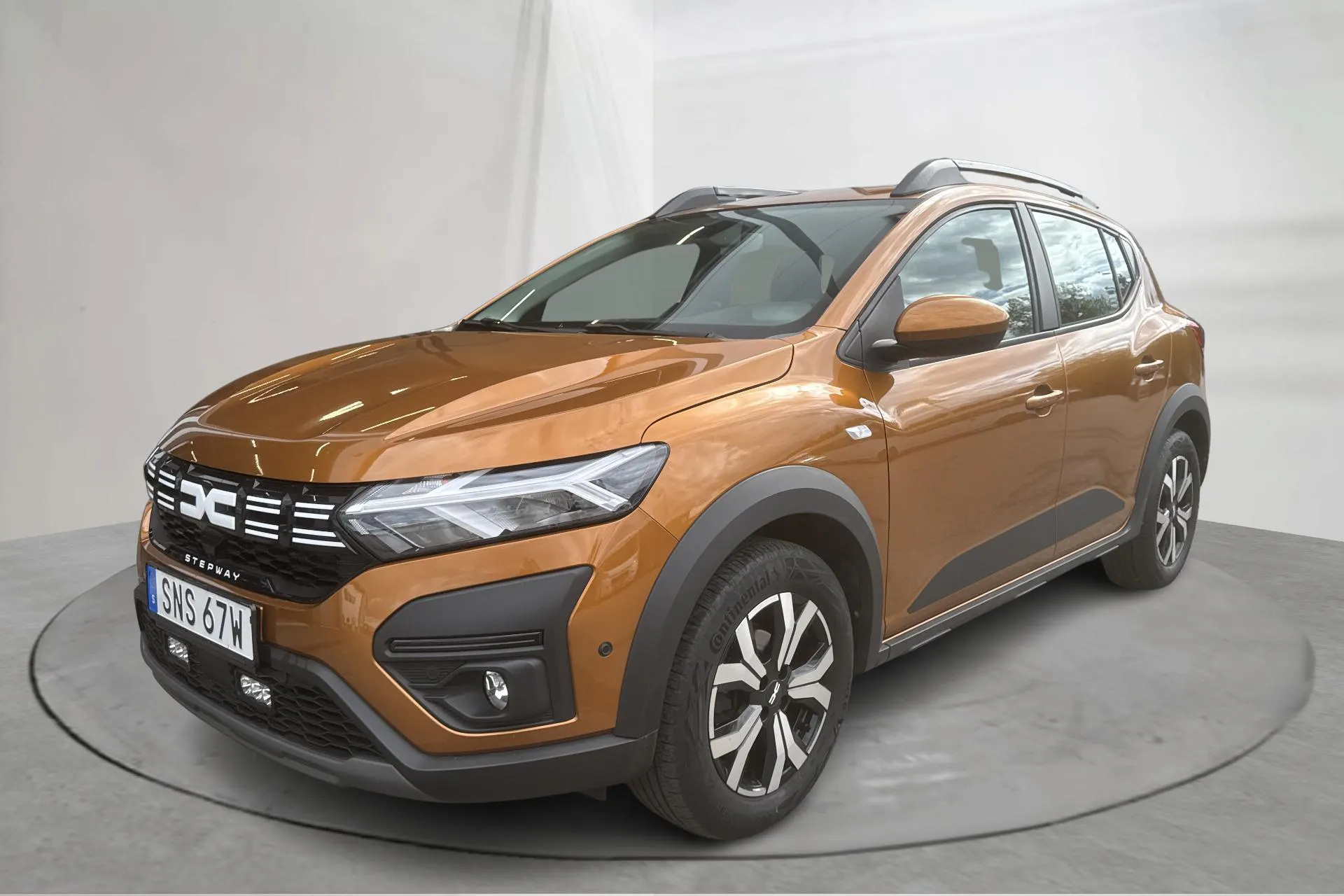 Presentation photo 1 of 14: Dacia Sandero Stepway 1.0 TCe (90hk) - 28 760 km - Automatic - orange - 2024