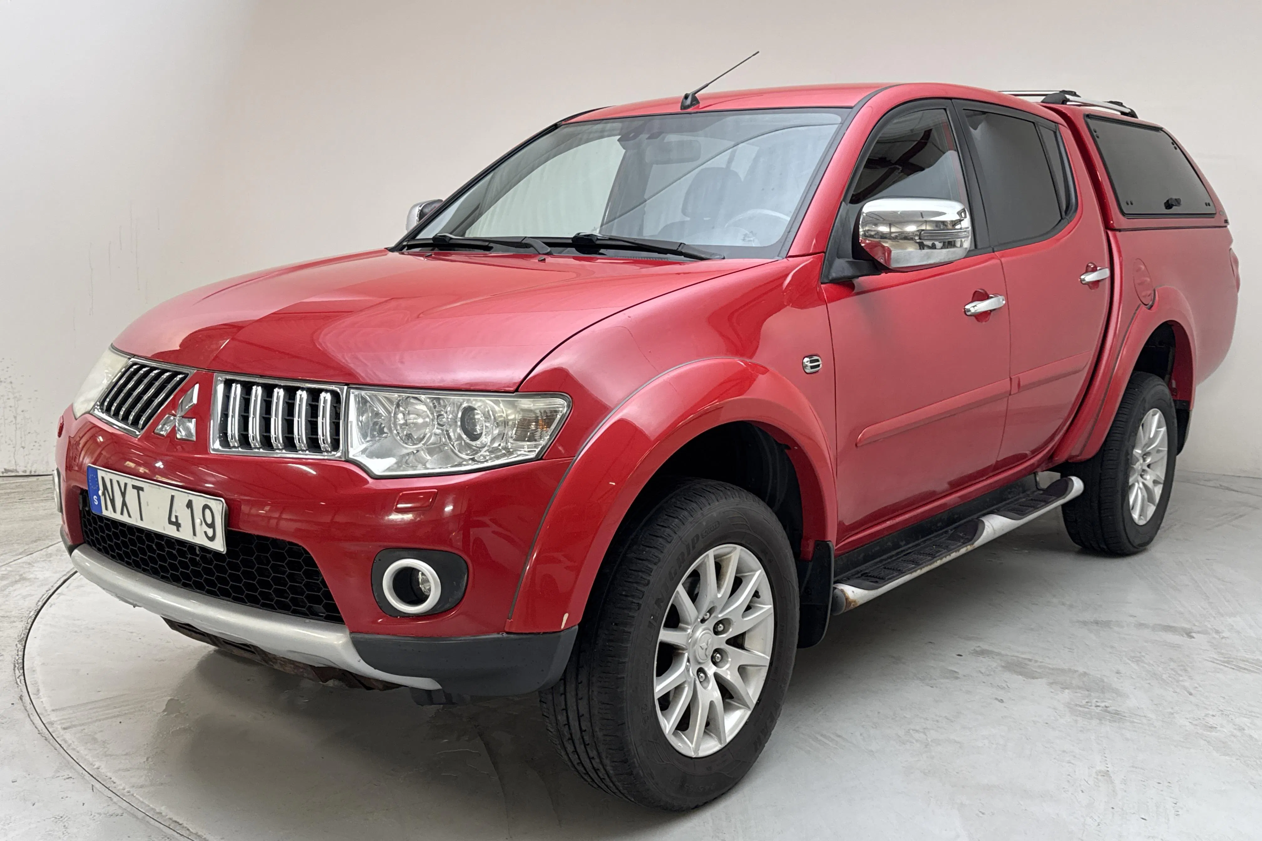 Presentation photo 1 of 13: Mitsubishi L200 2.5 DI-D (178hk) - 227 170 km - Automatic - red - 2014