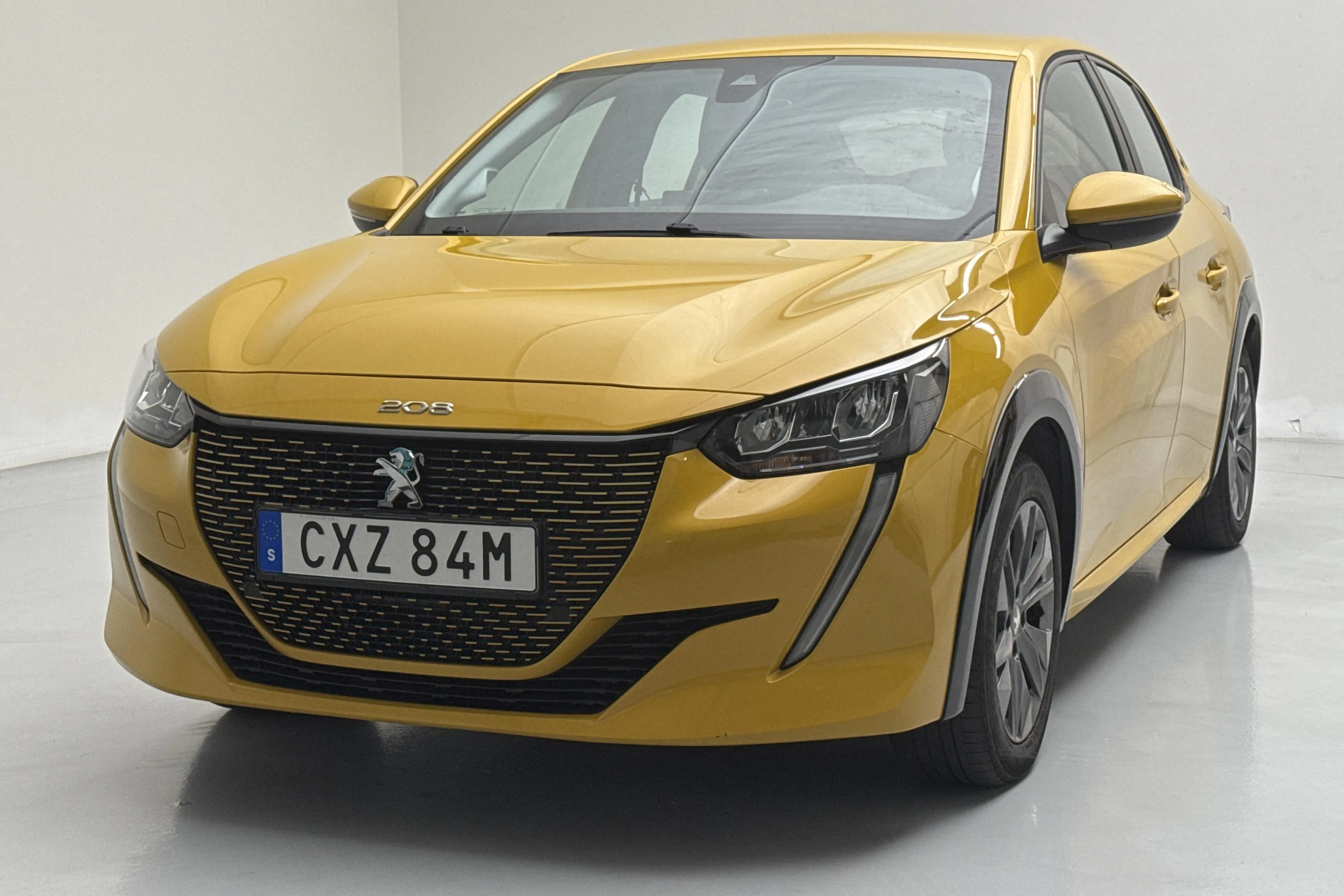 Presentation photo 1 of 15: Peugeot e-208 50kWh 5dr (136hk) - 120 940 km - Automatic - yellow - 2022