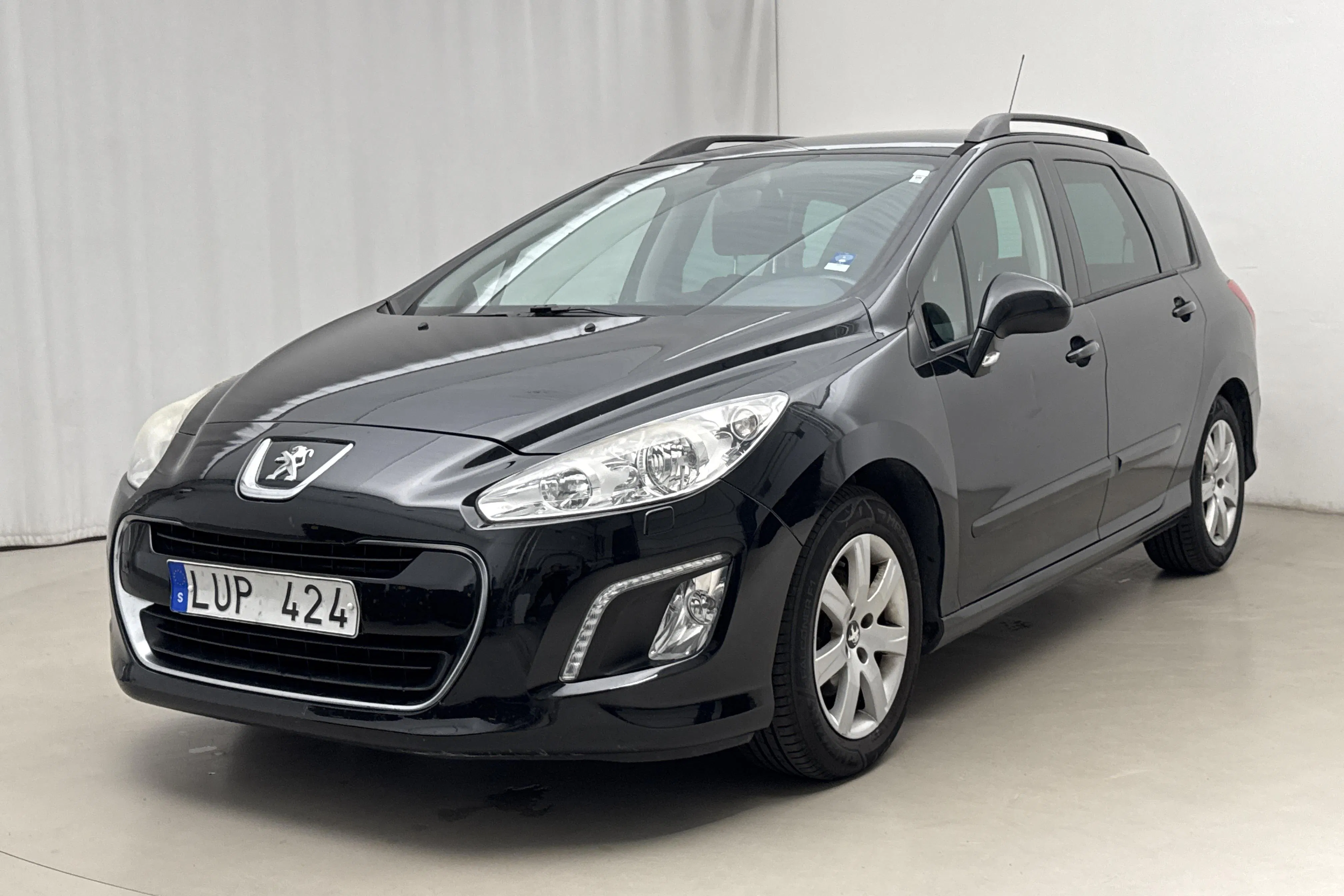 Presentationsfoto 1 av 15: Peugeot 308 SW 1.6 HDi FAP (110hk) - 10 388 mil - Automat - svart - 2011