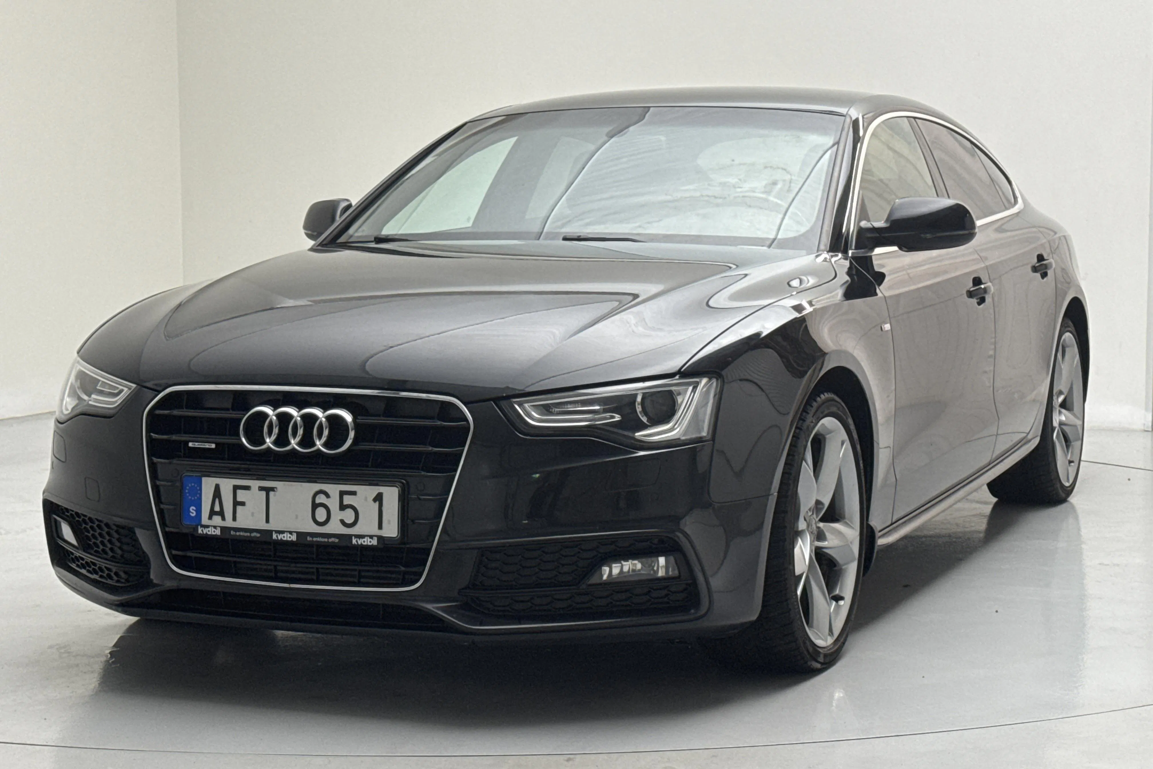 Presentationsfoto 1 av 11: Audi A5 2.0 TDI Sportback quattro (177hk) - 14 008 mil - Automat - svart - 2014