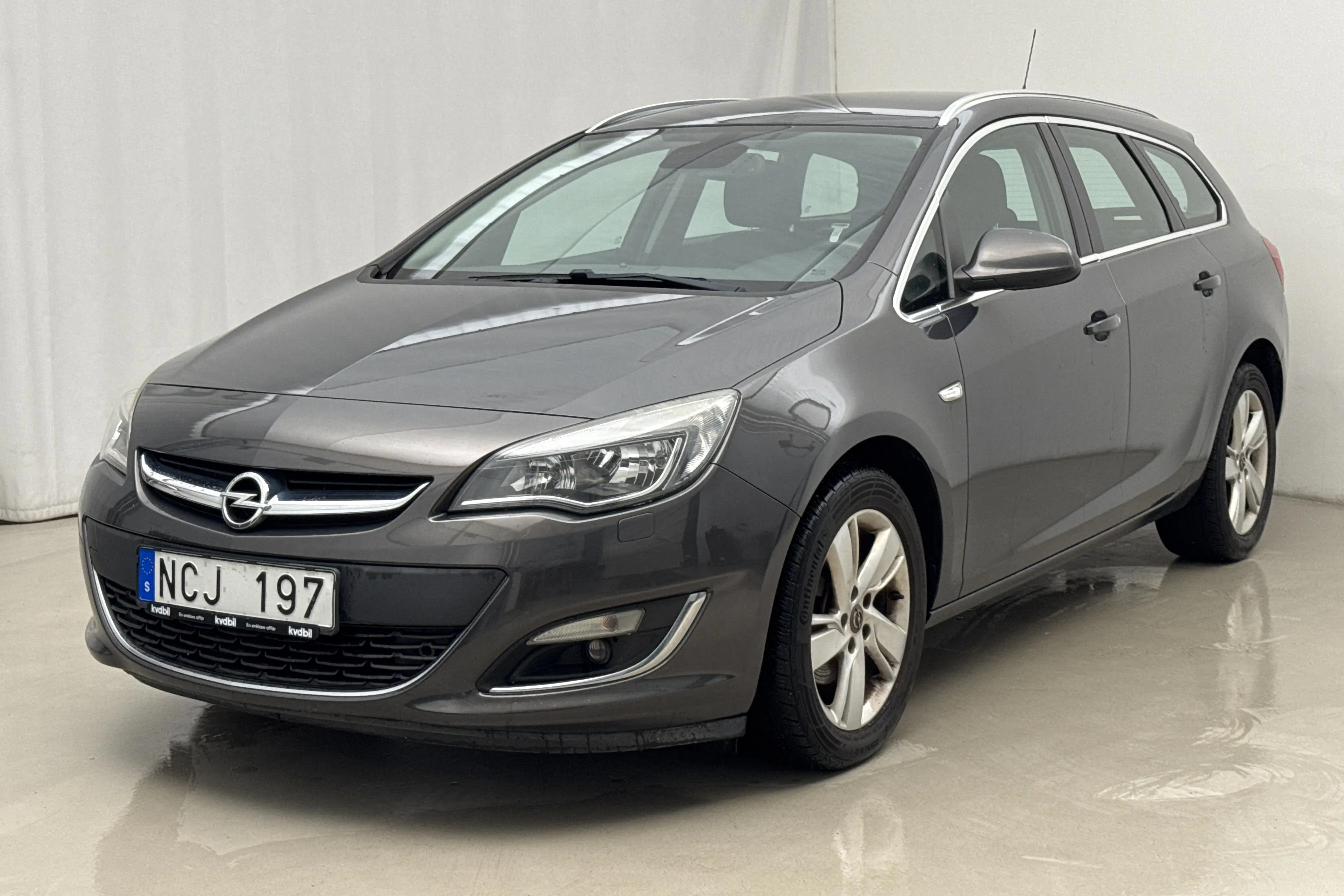 Presentation photo 1 of 15: Opel Astra 1.7 CDTI ecoFLEX Sports Tourer (110hk) - 141 950 km - Manual - gray - 2013