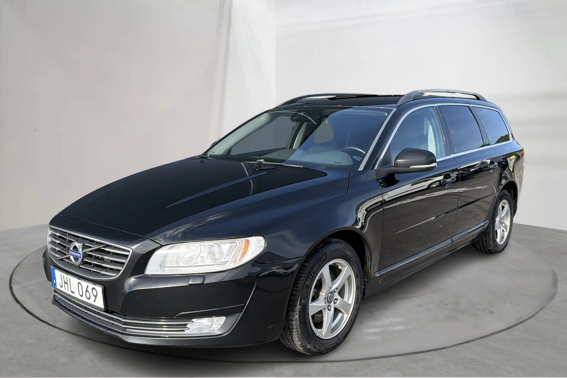 Presentationsfoto 1 av 16: Volvo V70 II D4 (181hk) - 35 403 mil - Automat - svart - 2015