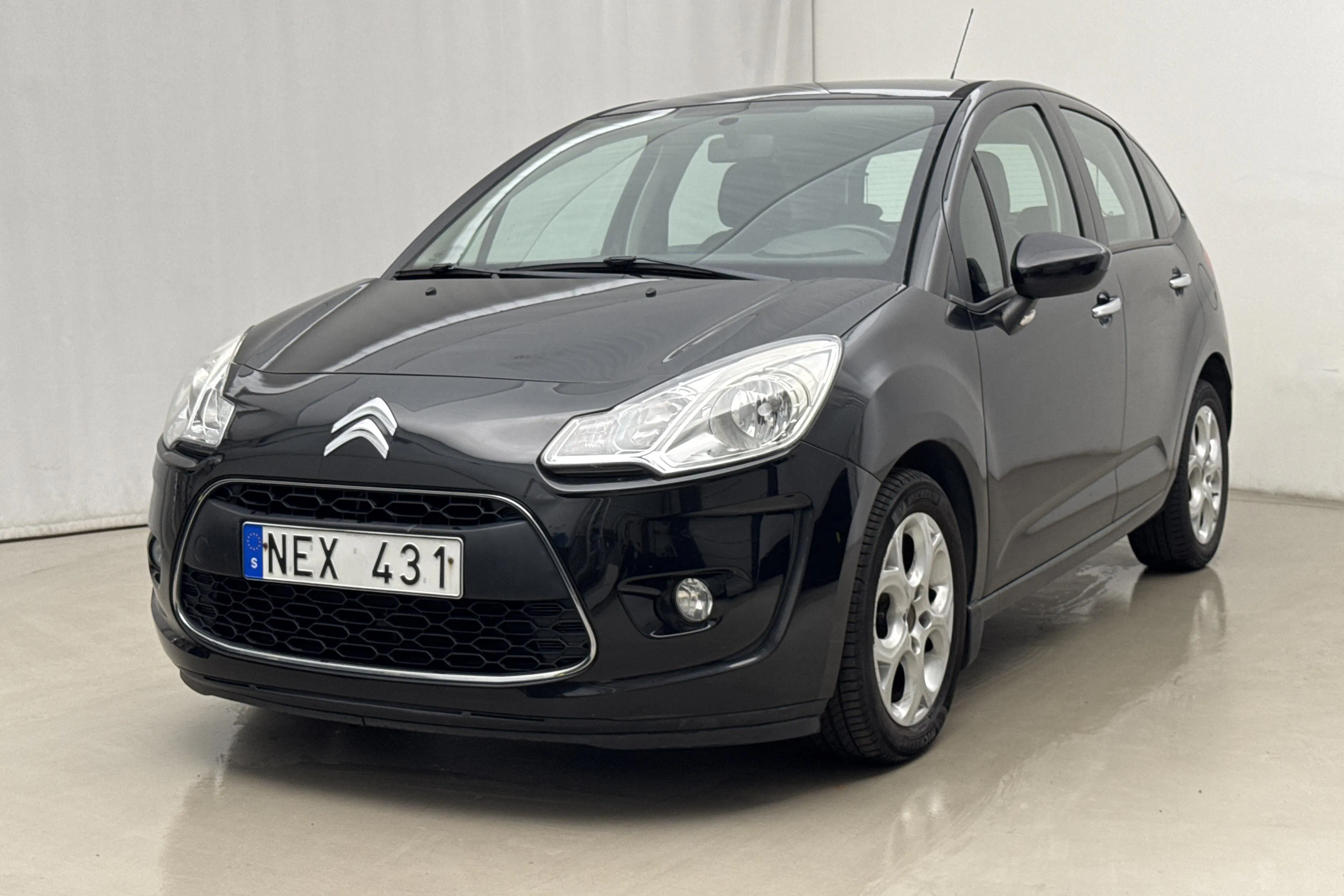 Presentation photo 1 of 15: Citroën C3 1.4 HDi (70hk) - 83 620 km - Manual - black - 2012