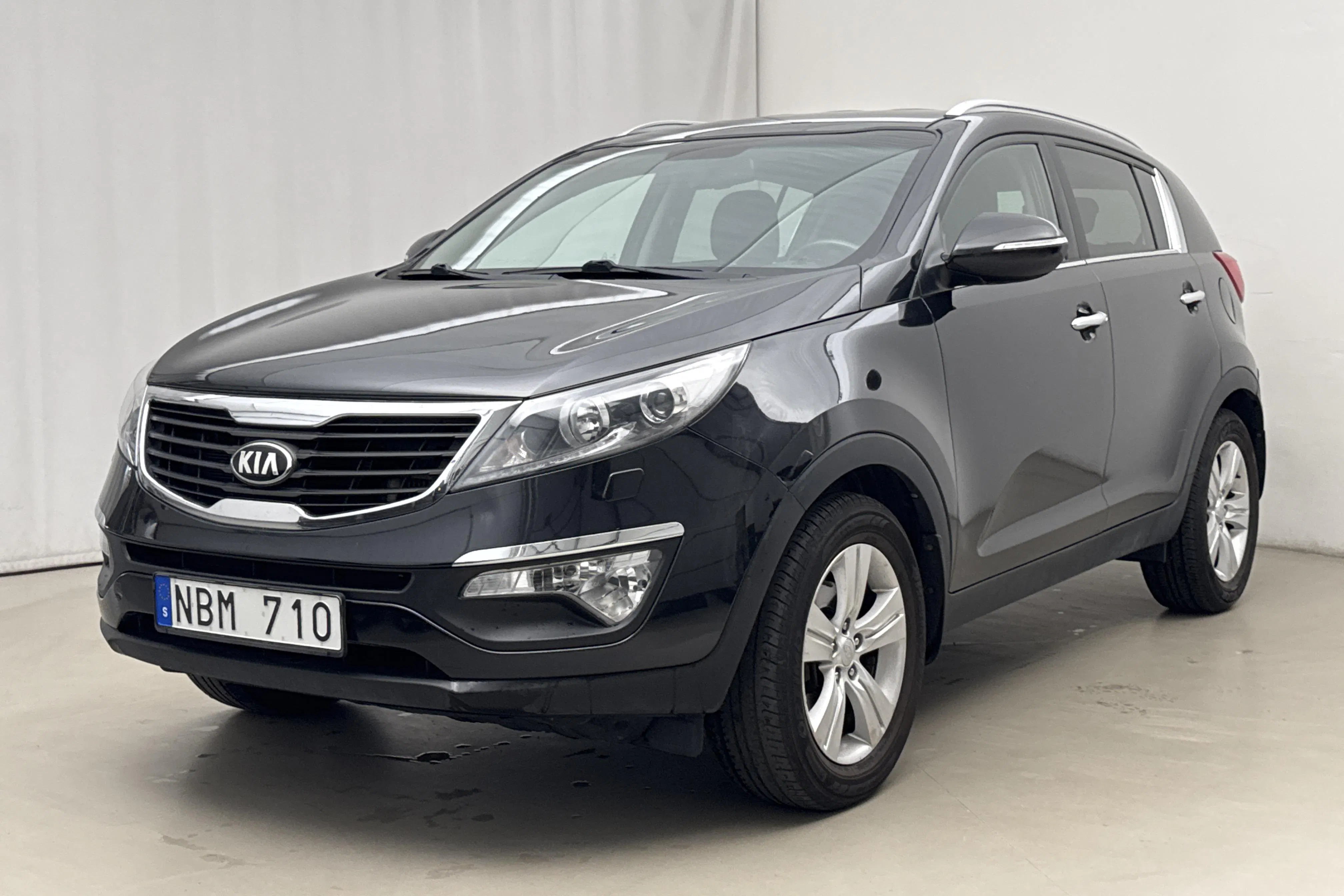 Presentationsfoto 1 av 16: KIA Sportage 1.7 CRDi 2WD (115hk) - 14 048 mil - Manuell - svart - 2013