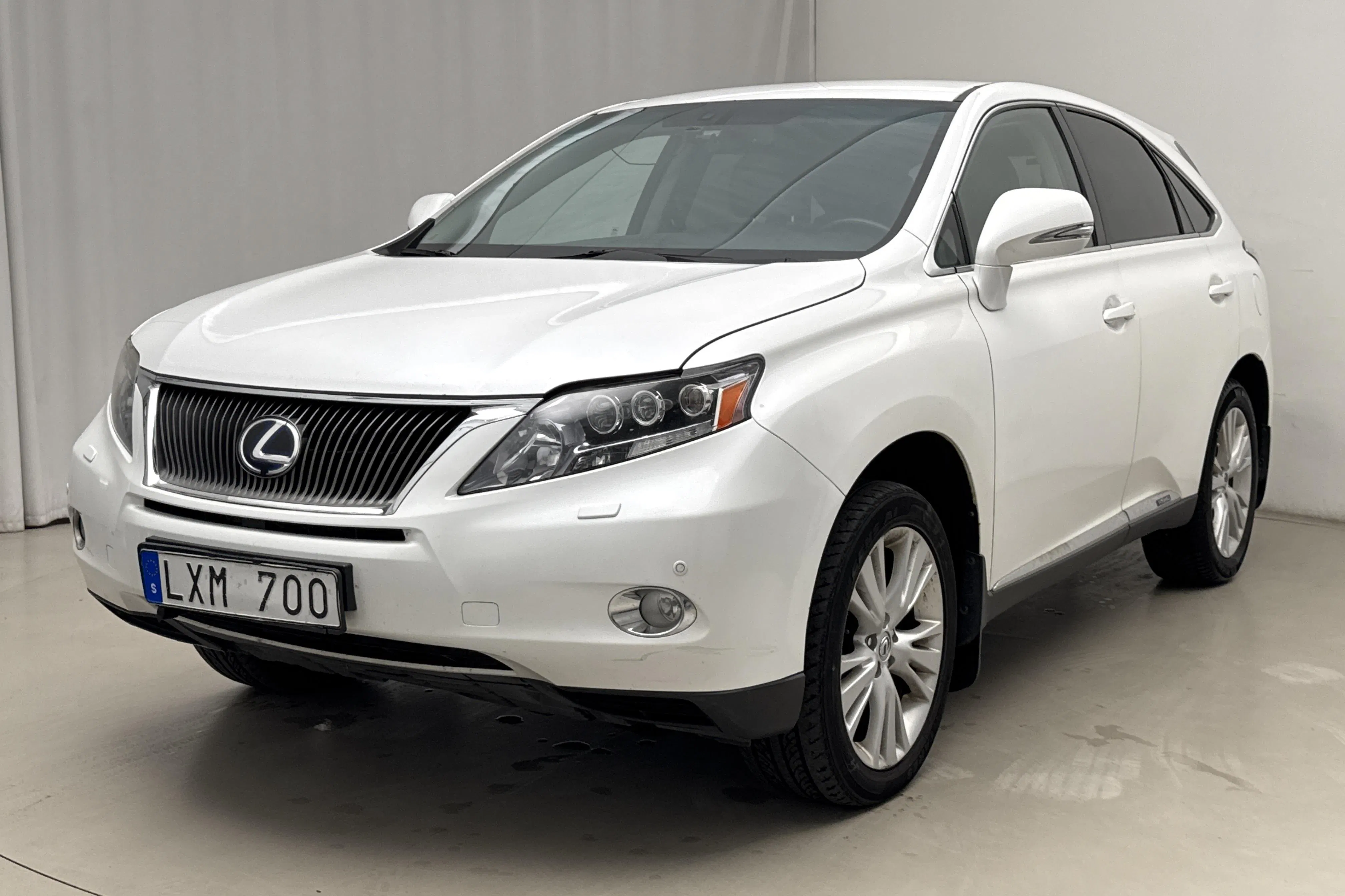 Presentation photo 1 of 19: Lexus RX 450h AWD (249hk) - 252 970 km - Automatic - white - 2011