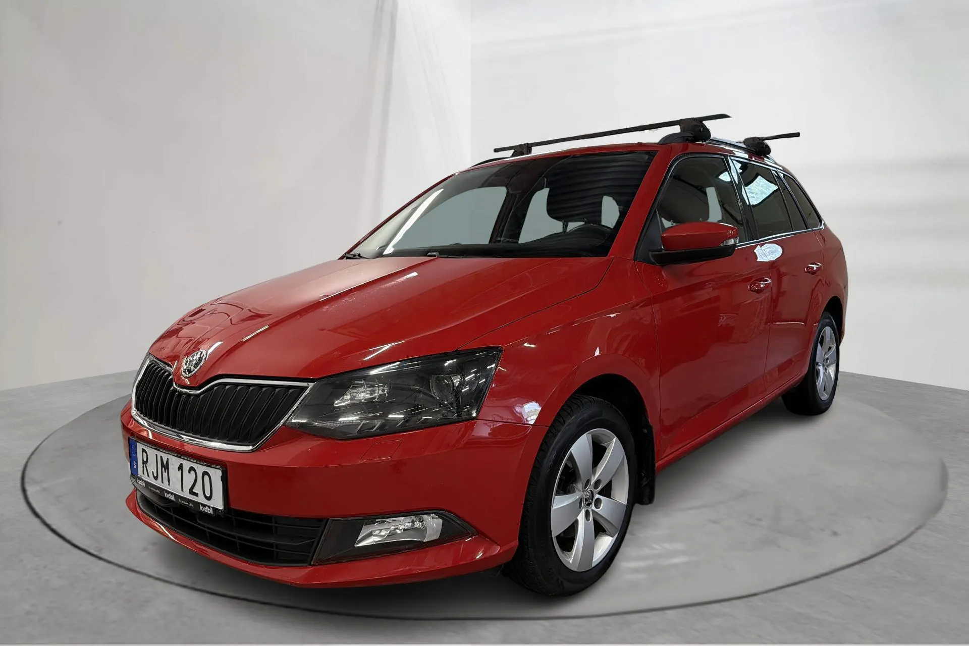 Presentationsfoto 1 av 12: Skoda Fabia 1.2 TSI Kombi (90hk) - 21 131 mil - Manuell - röd - 2017