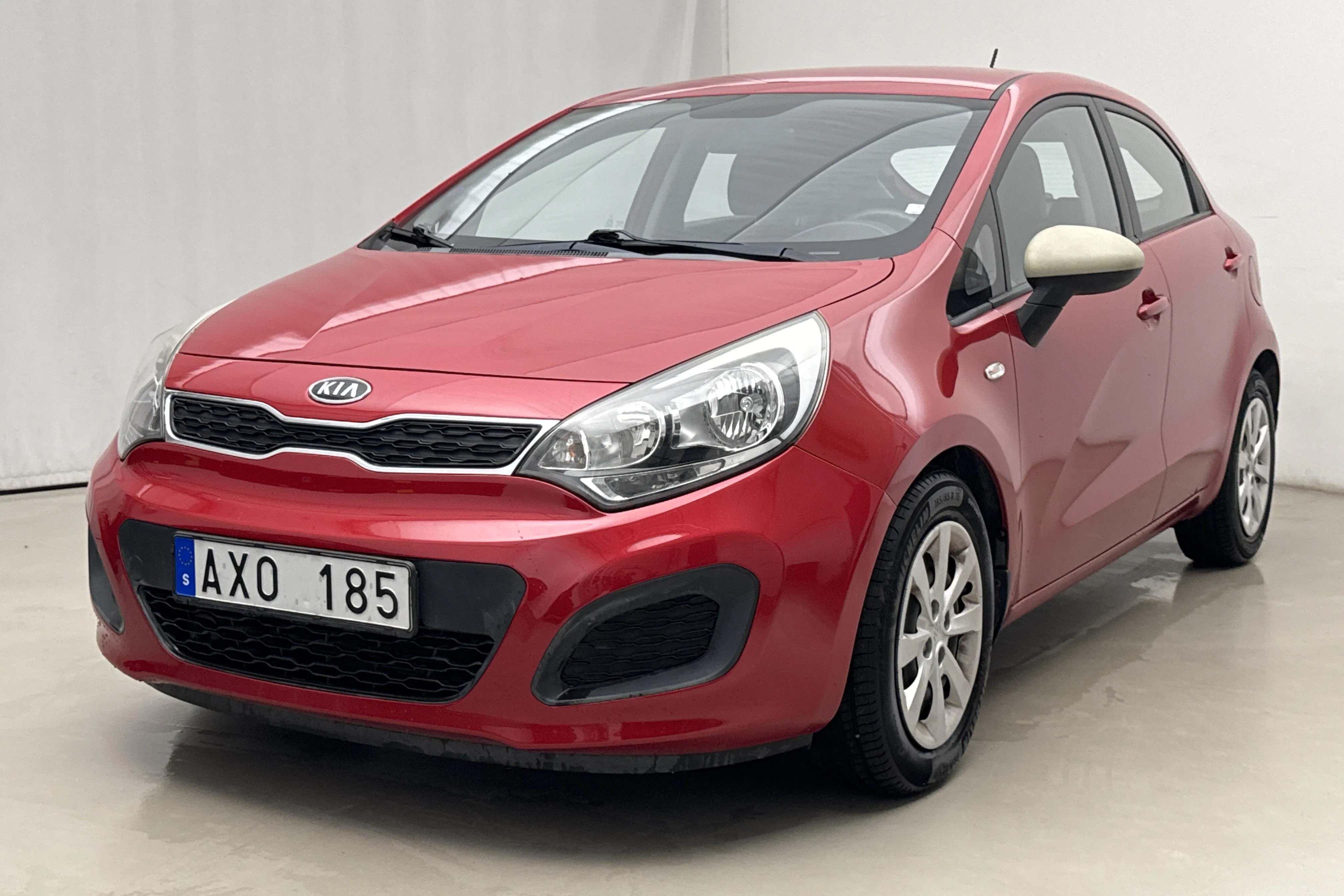 Presentation photo 1 of 15: KIA Rio 1.2 (85hk) - 71 520 km - Manual - red - 2012