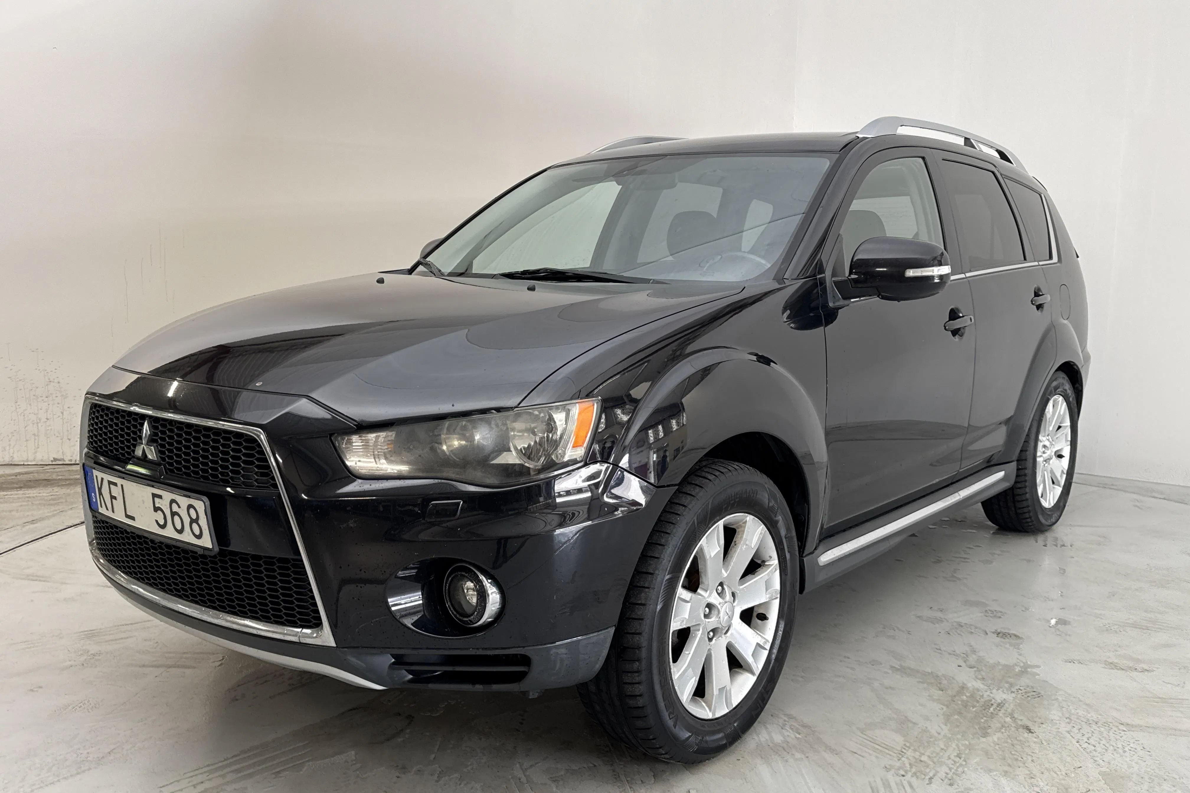 Presentation photo 1 of 12: Mitsubishi Outlander 2.4 FFV (170hk) - 221 600 km - Automatic - black - 2010