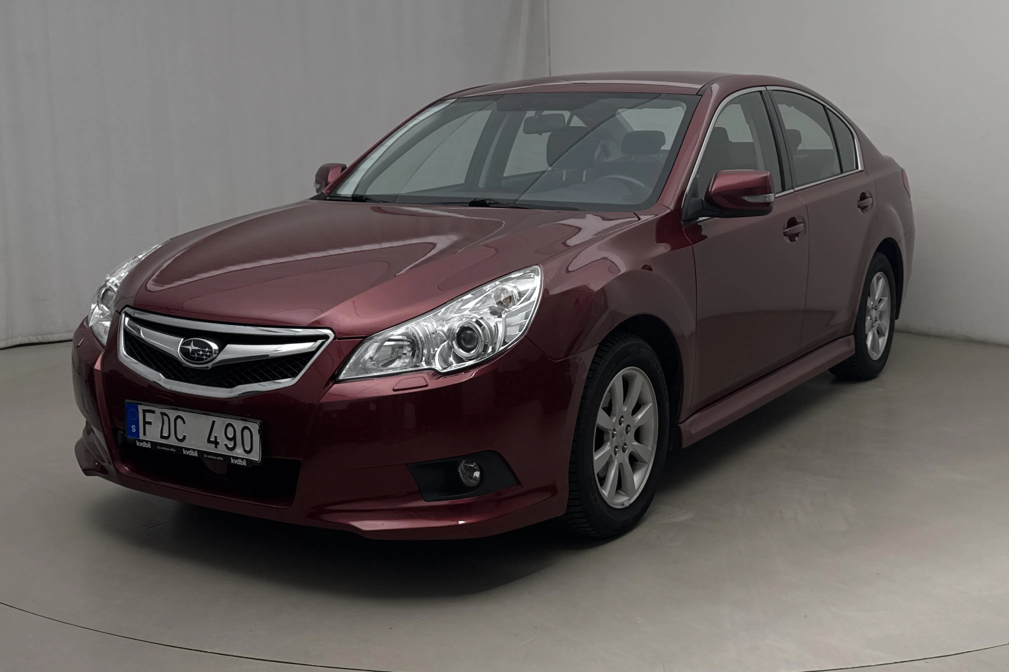 Presentation photo 1 of 15: Subaru Legacy 2.0i Sedan (150hk) - 170 390 km - Automatic - red - 2010