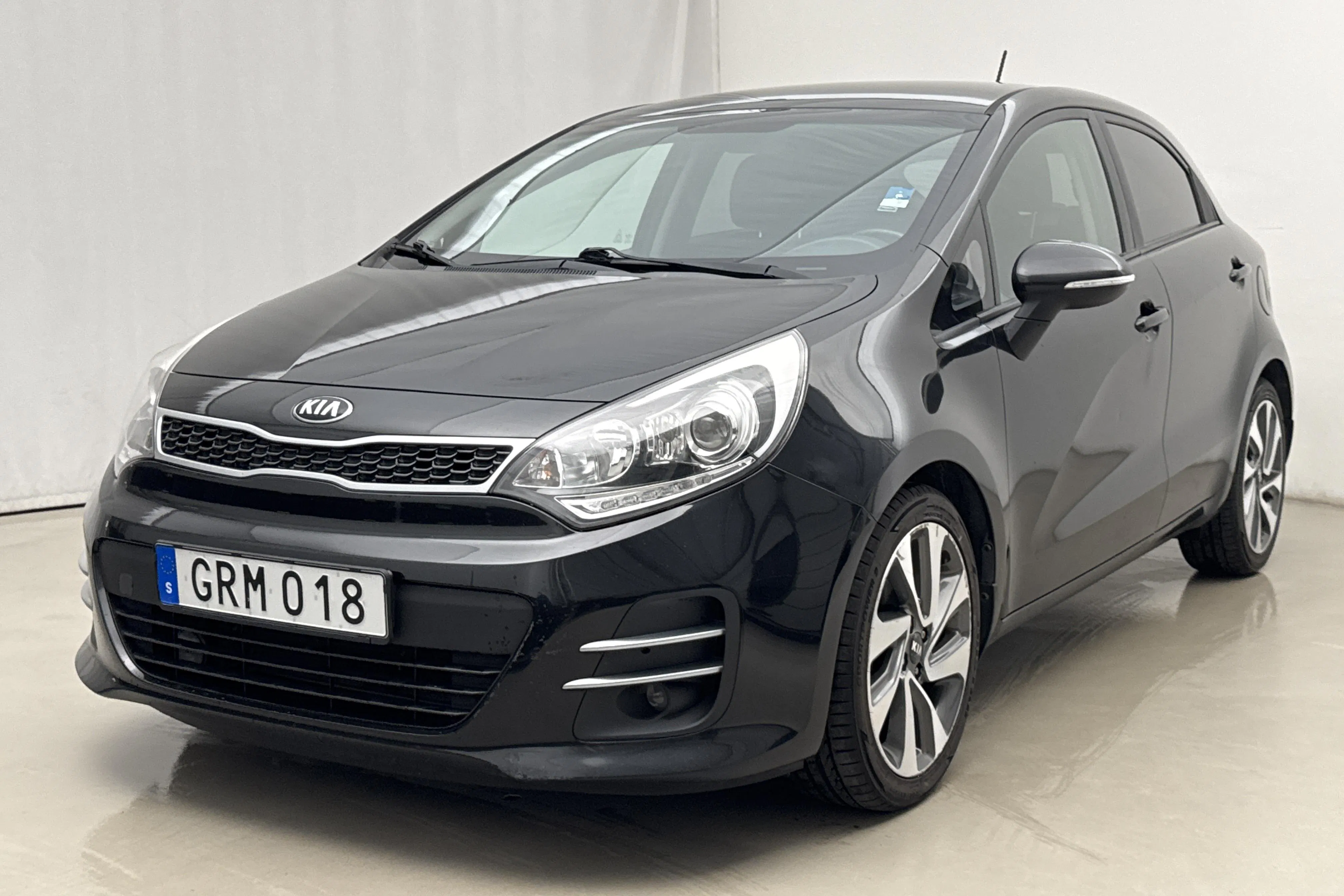 Presentation photo 1 of 16: KIA Rio 1.2 (85hk) - 120 770 km - Manual - black - 2015