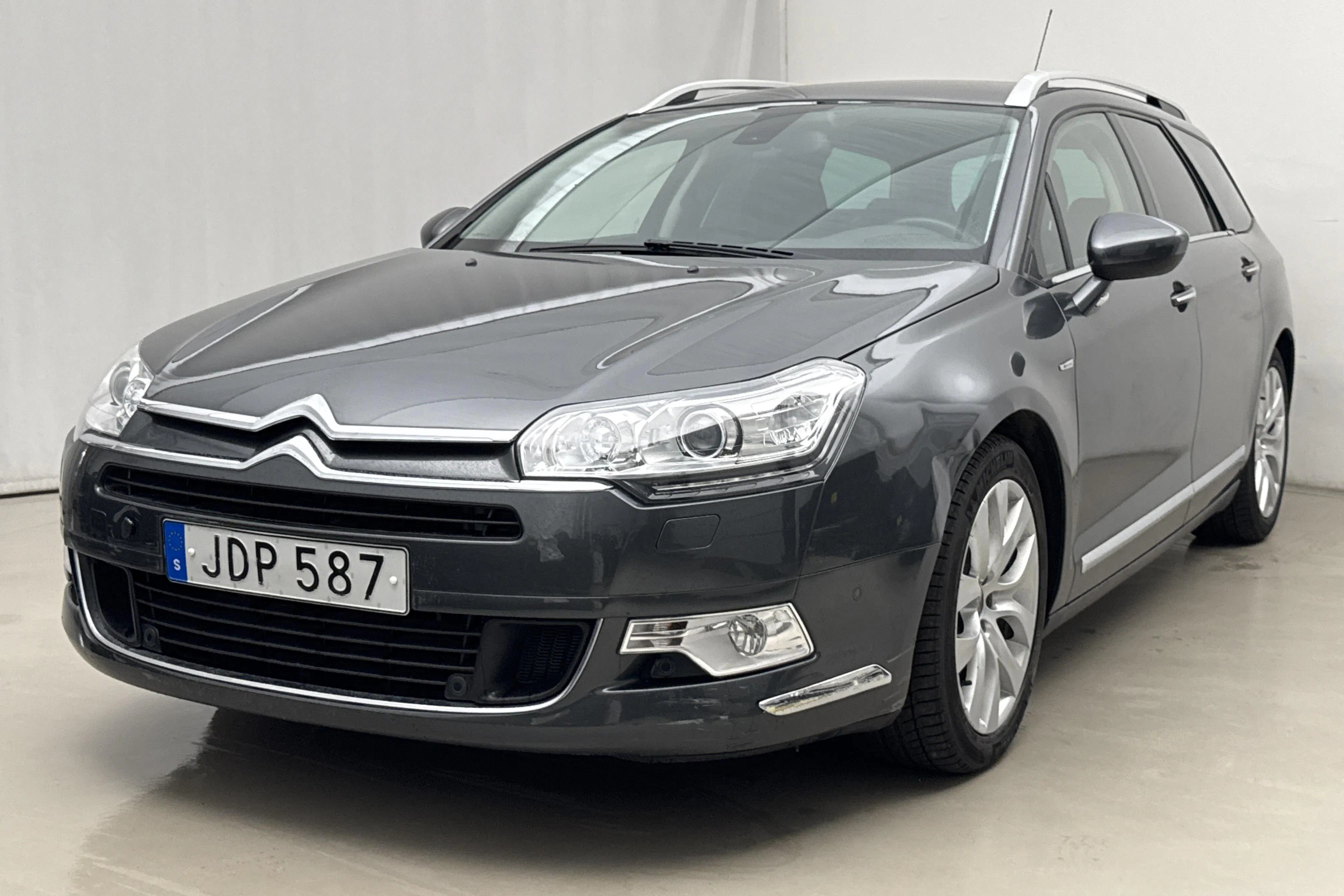 Presentation photo 1 of 17: Citroën C5 III 2.0 BlueHDi Tourer (180hk) - 29 500 km - Automatic - gray - 2016