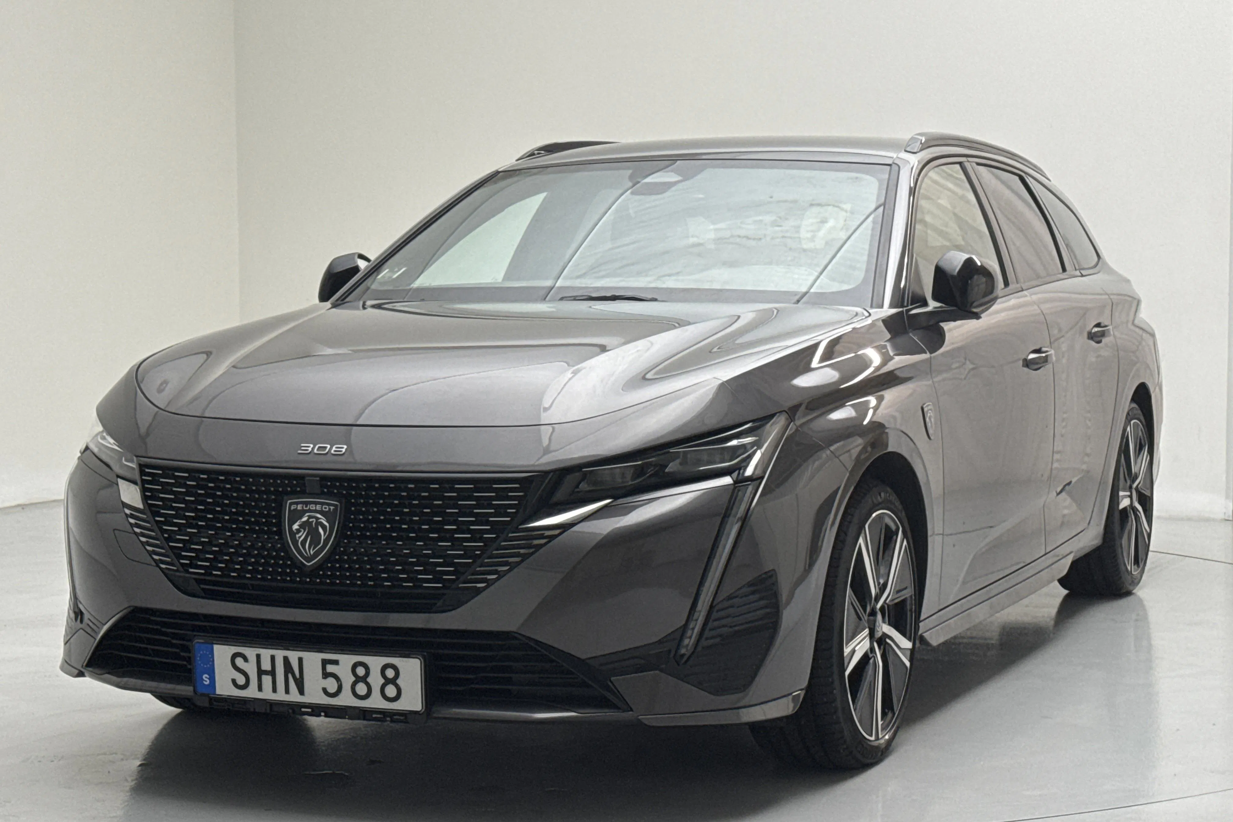 Presentationsfoto 1 av 15: Peugeot 308 1.2 PureTech SW (130hk) - 4 008 mil - Automat - grå - 2023