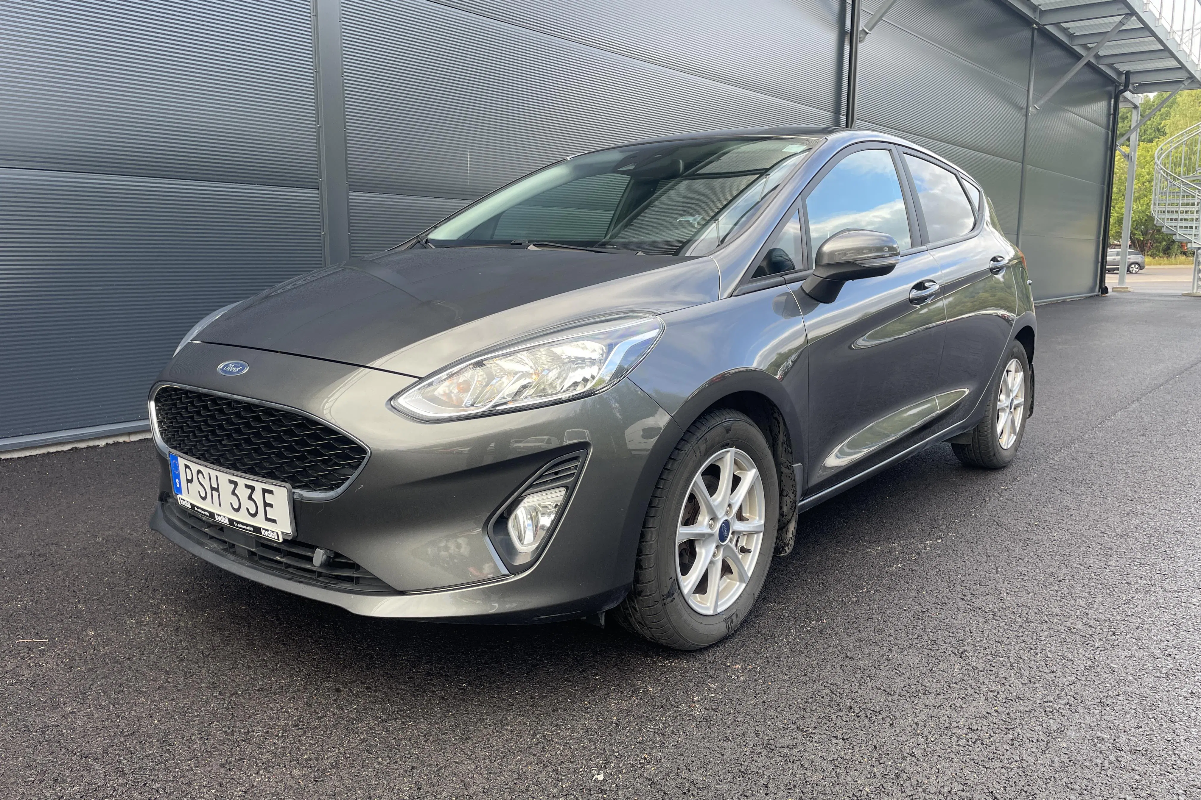 Presentation photo 1 of 12: Ford Fiesta 1.0T EcoBoost 5dr (100hk) - 59 830 km - Automatic - gray - 2019