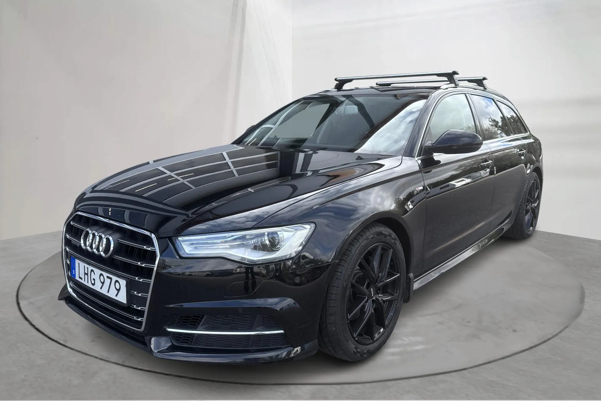 Presentation photo 1 of 13: Audi A6 2.0 TDI Avant quattro (190hk) - 191 420 km - Automatic - black - 2017