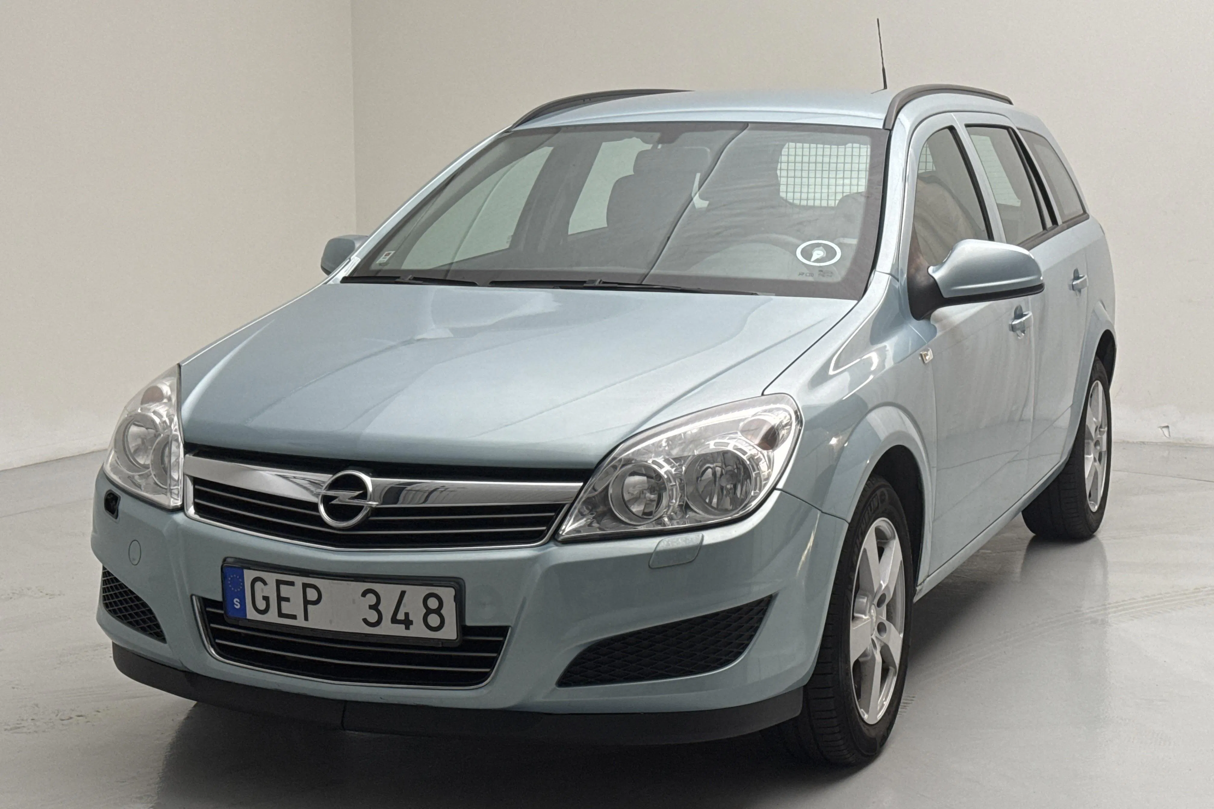Presentation photo 1 of 12: Opel Astra 1.6 Kombi (115hk) - 147 310 km - Manual - blue - 2010