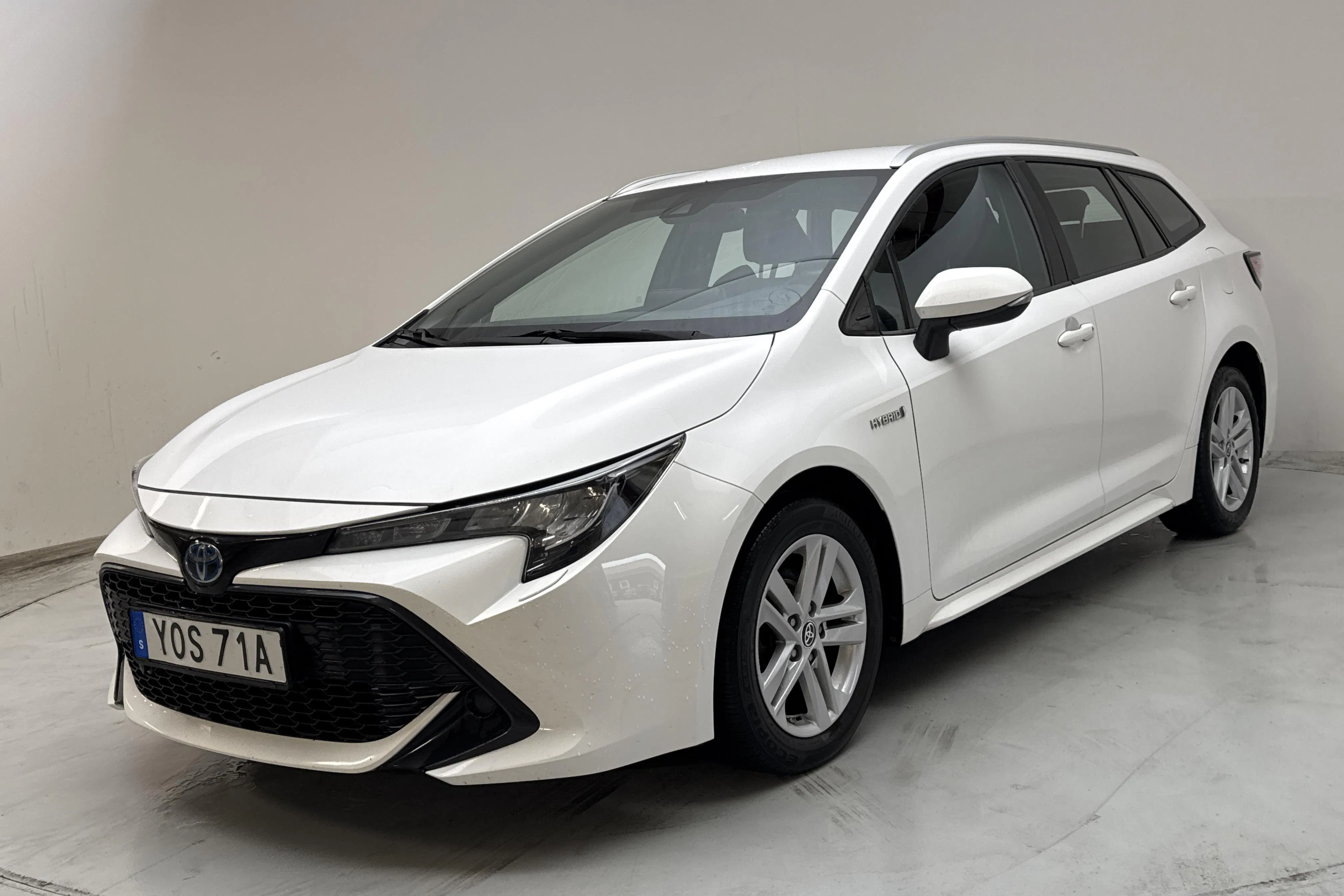 Presentationsfoto 1 av 13: Toyota Corolla 1.8 Hybrid Touring Sports (122hk) - 9 359 mil - Automat - vit - 2020