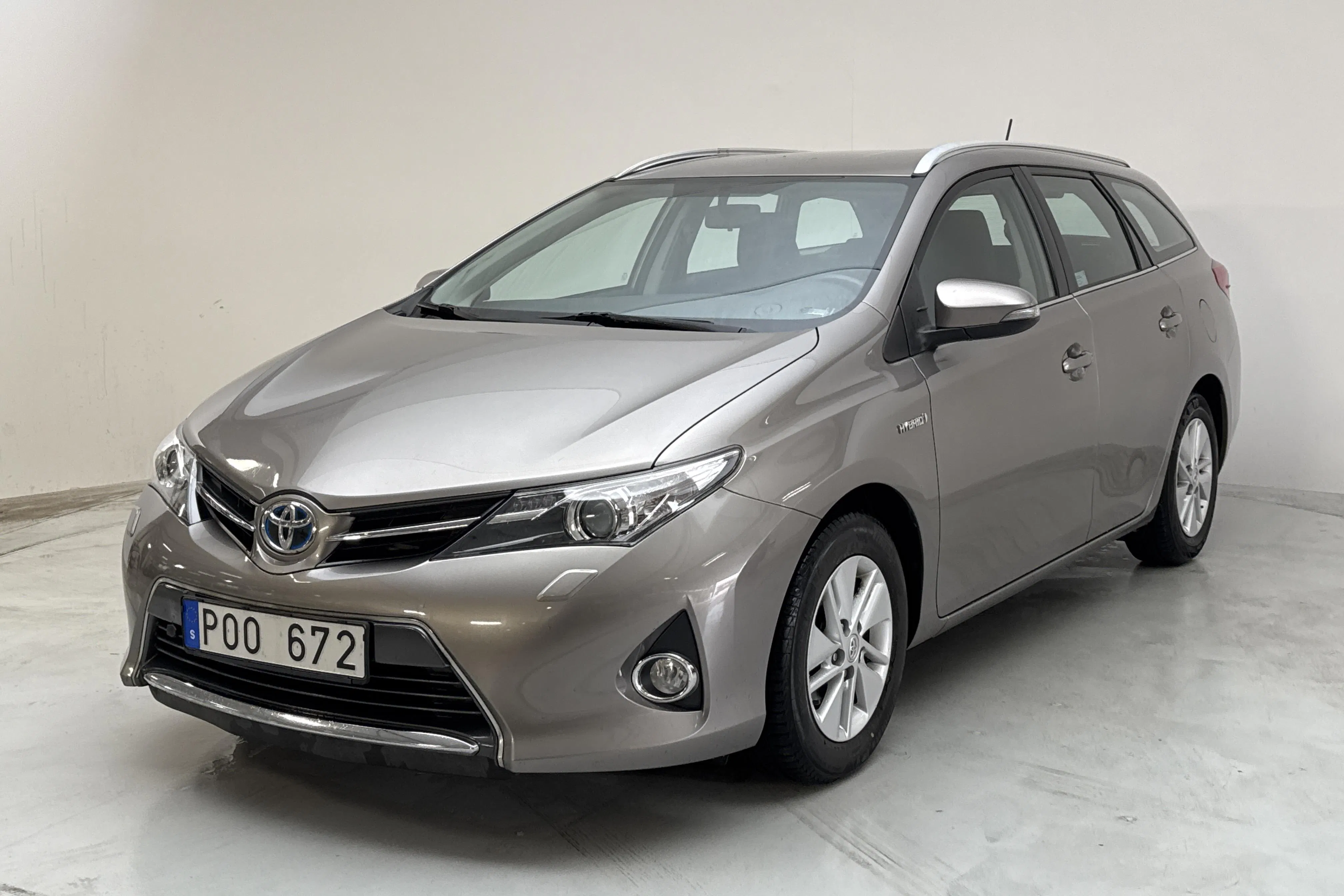 Presentation photo 1 of 14: Toyota Auris 1.8 HSD Touring Sports (99hk) - 110 820 km - Automatic - brown - 2014