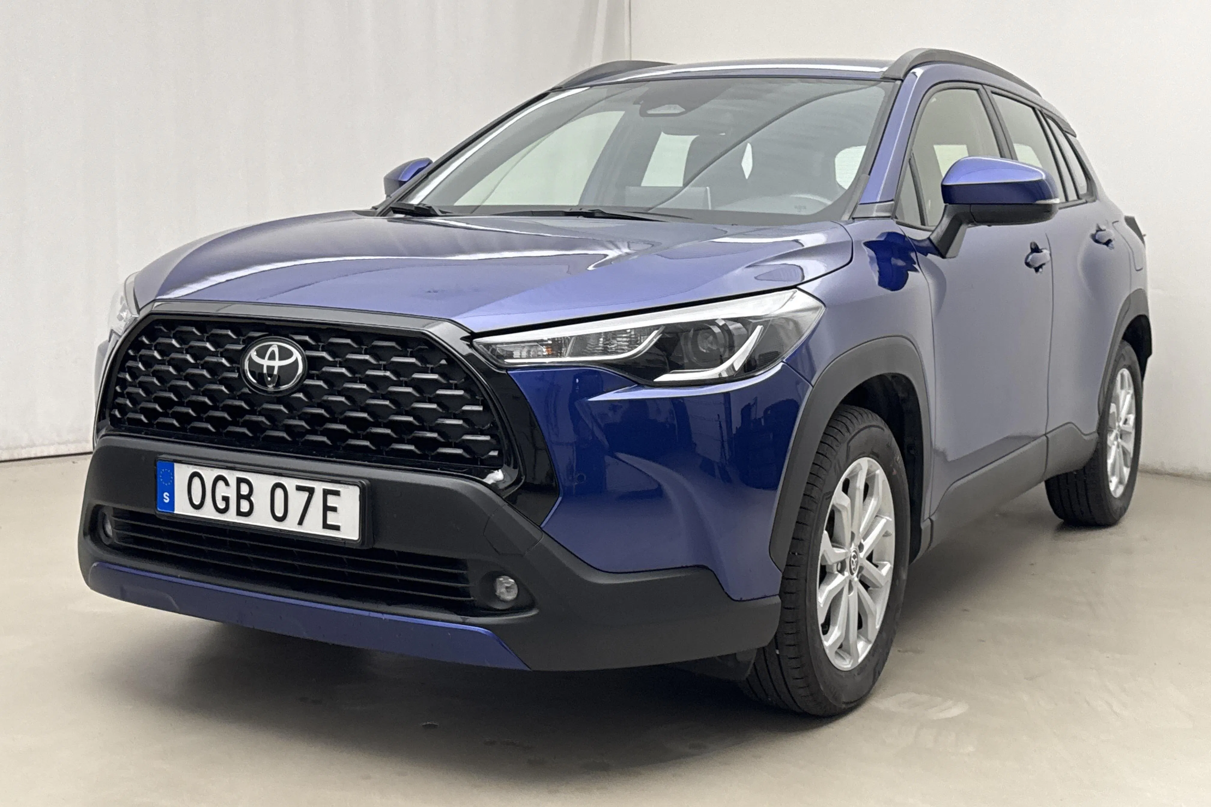 Presentation photo 1 of 17: Toyota Corolla Cross 2.0 AWD-i Elhybrid (197hk) - 78 830 km - Automatic - dark blue - 2024