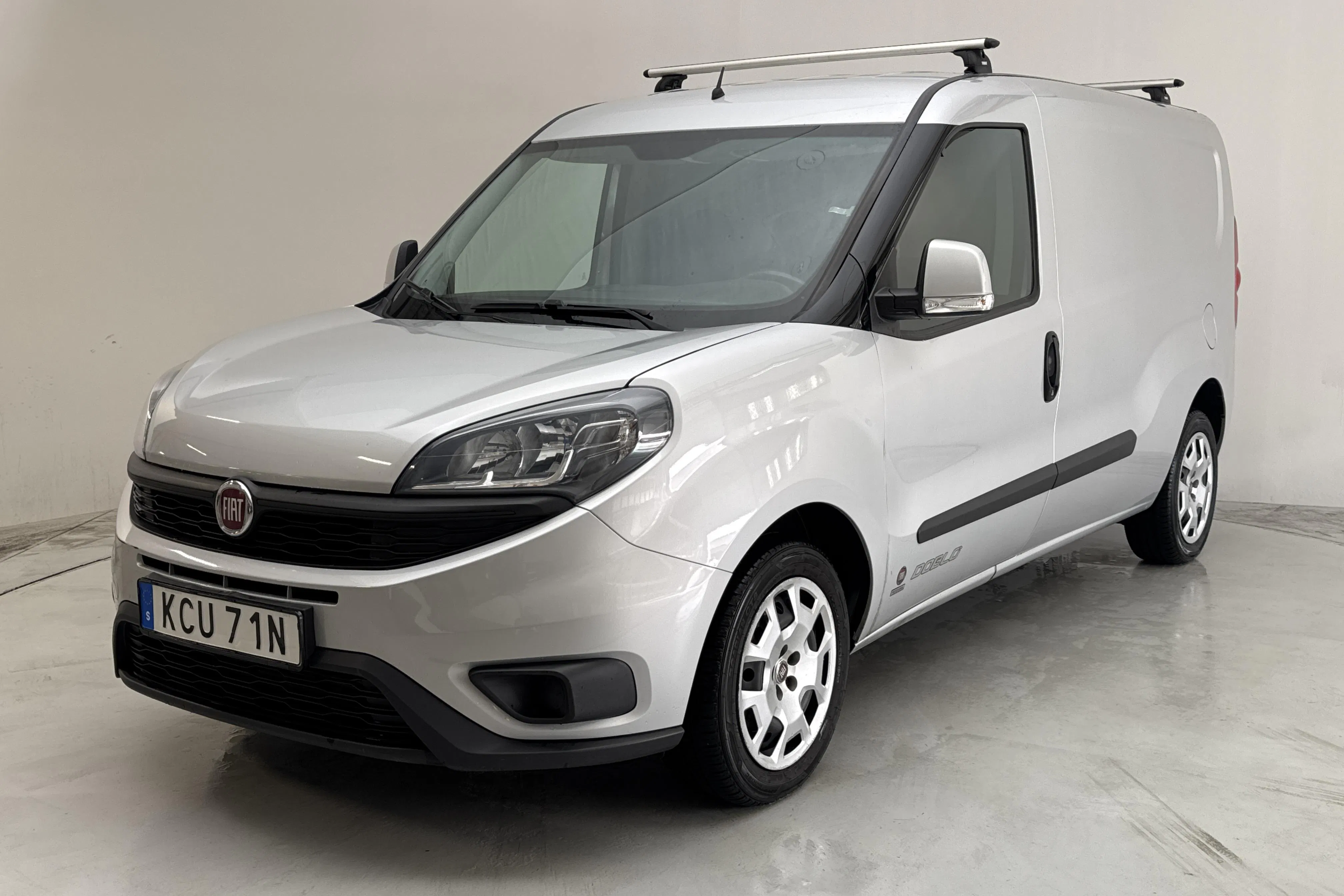 Presentation photo 1 of 10: Fiat Doblo Cargo 1.4T CNG (120hk) - 108 990 km - Manual - gray - 2021