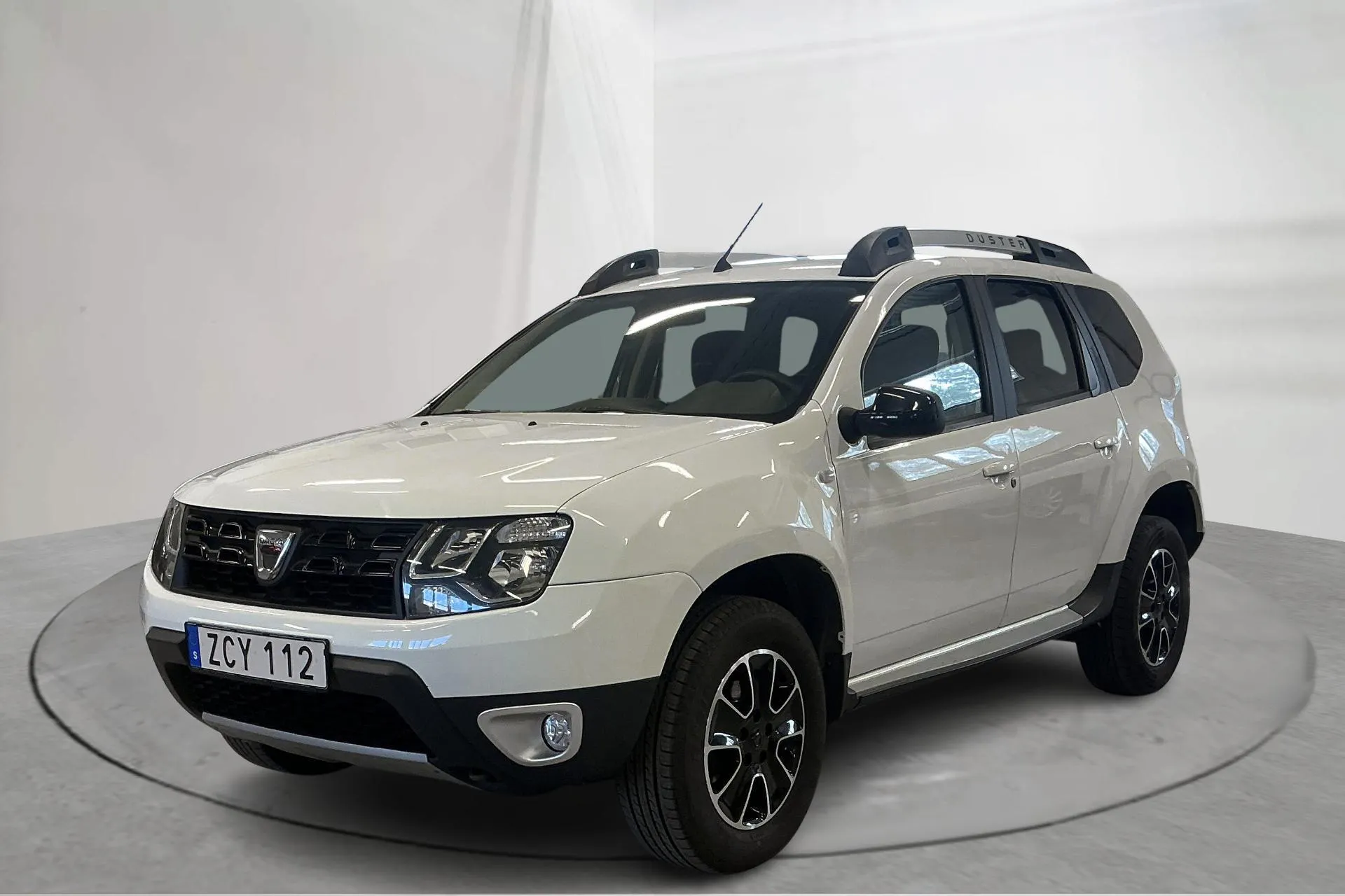 Presentationsfoto 1 av 14: Dacia Duster 1.2 4x2 (125hk) - 13 676 mil - Manuell - vit - 2018