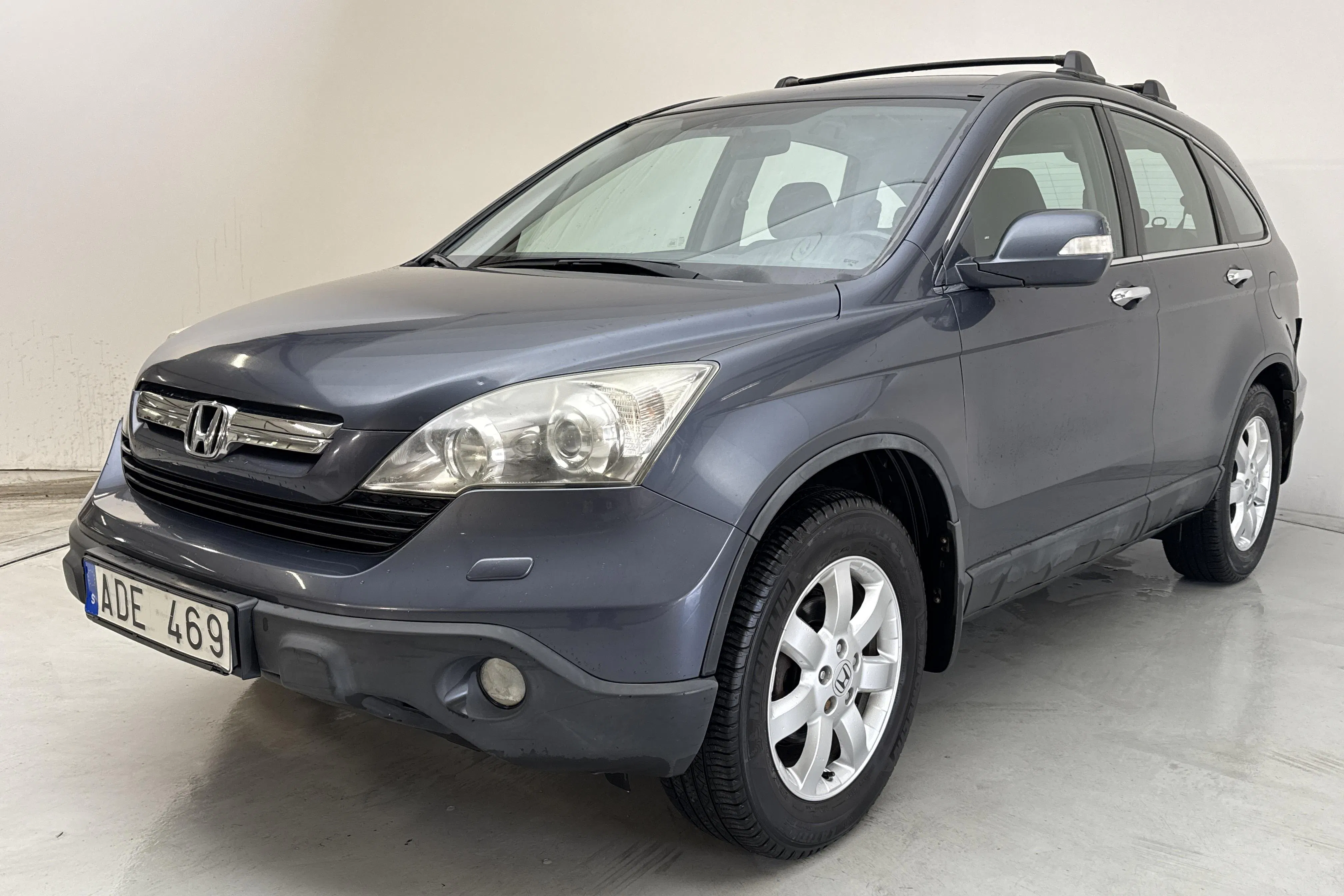 Presentationsfoto 1 av 12: Honda CR-V 2.0 (150hk) - 21 632 mil - Automat - Mörkgrå - 2007