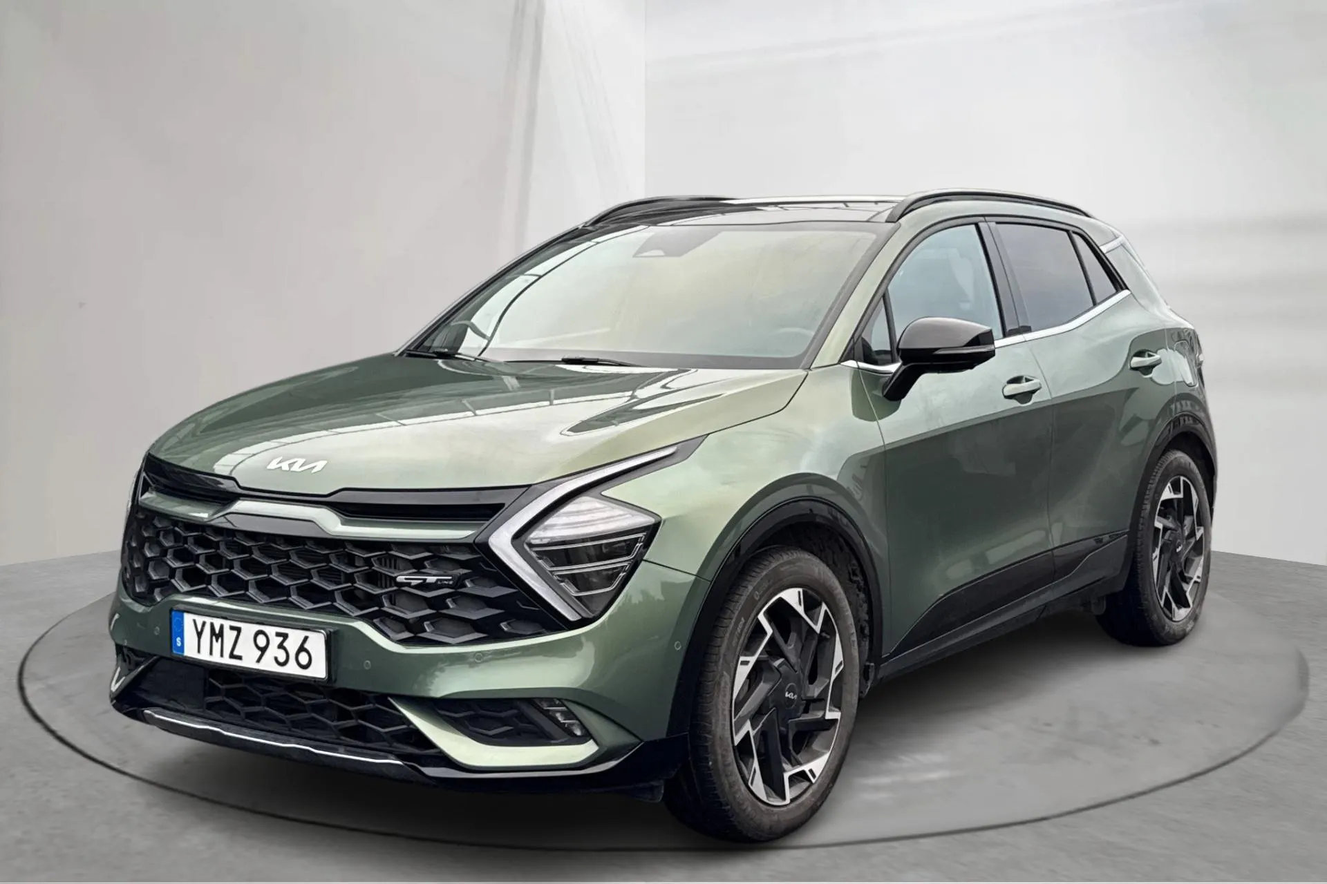 Presentationsfoto 1 av 19: KIA Sportage PHEV AWD (265hk) - 6 675 mil - Automat - grön - 2022