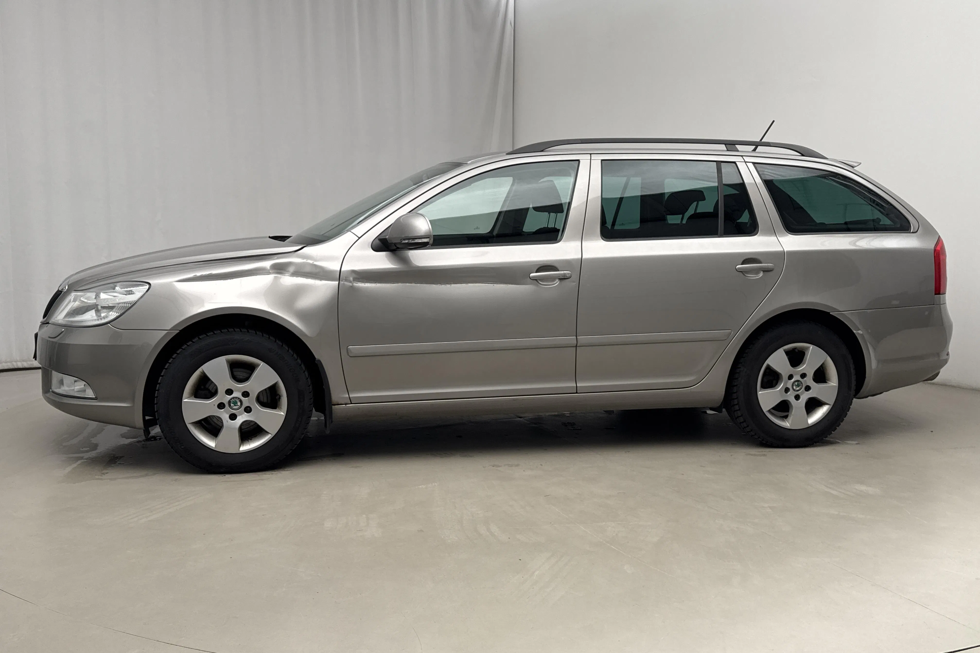 Presentationsfoto 2 av 14: Skoda Octavia II 1.4 TSI Kombi (122hk) - 13 426 mil - Automat - Ljusbrun - 2013
