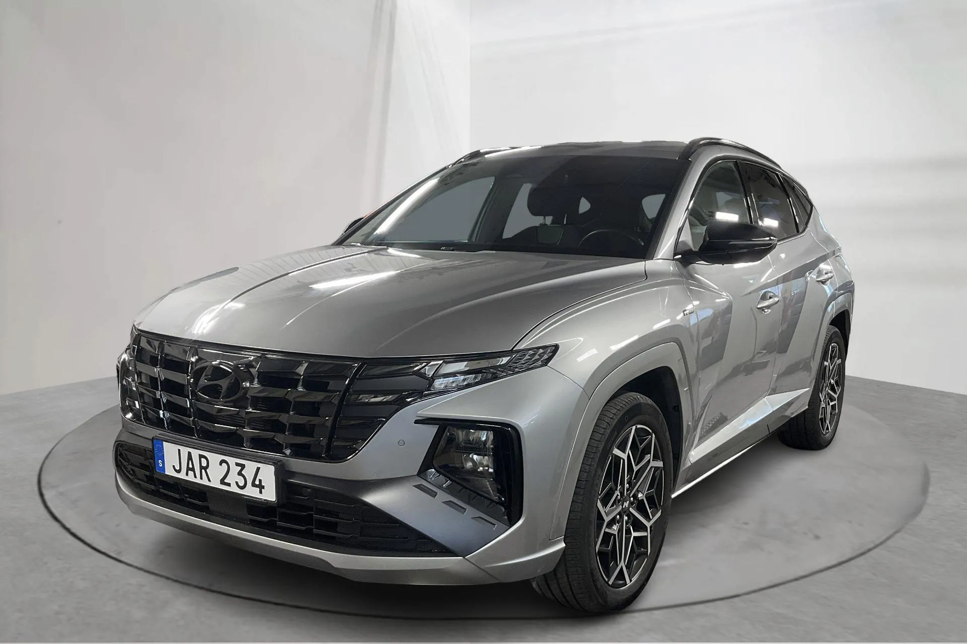 Presentationsfoto 1 av 18: Hyundai Tucson 1.6 GDI plug-in hybrid 4WD (265hk) - 2 750 mil - Automat - grå - 2022