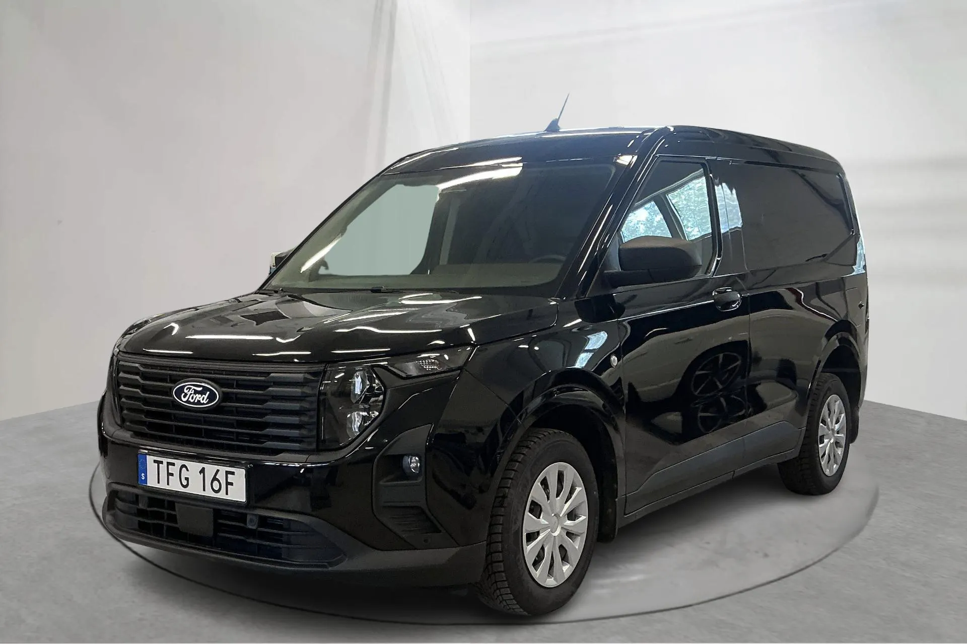 Presentation photo 1 of 14: Ford Transit Courier 1.0T Ecoboost (125hk) - 18 640 km - Automatic - black - 2024