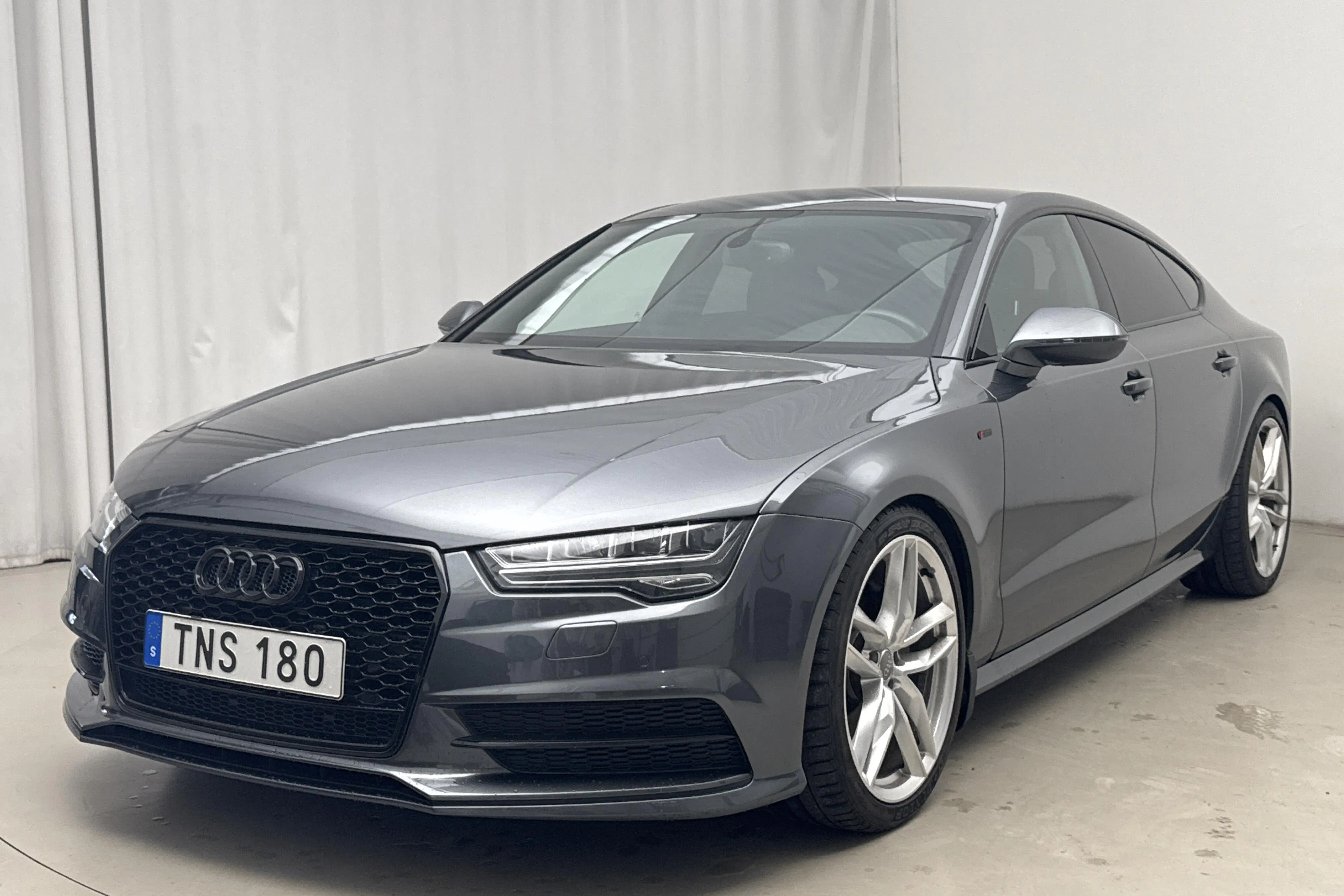 Presentation photo 1 of 14: Audi A7 2.0 TFSI Sportback quattro (252hk) - 112 170 km - Automatic - gray - 2018