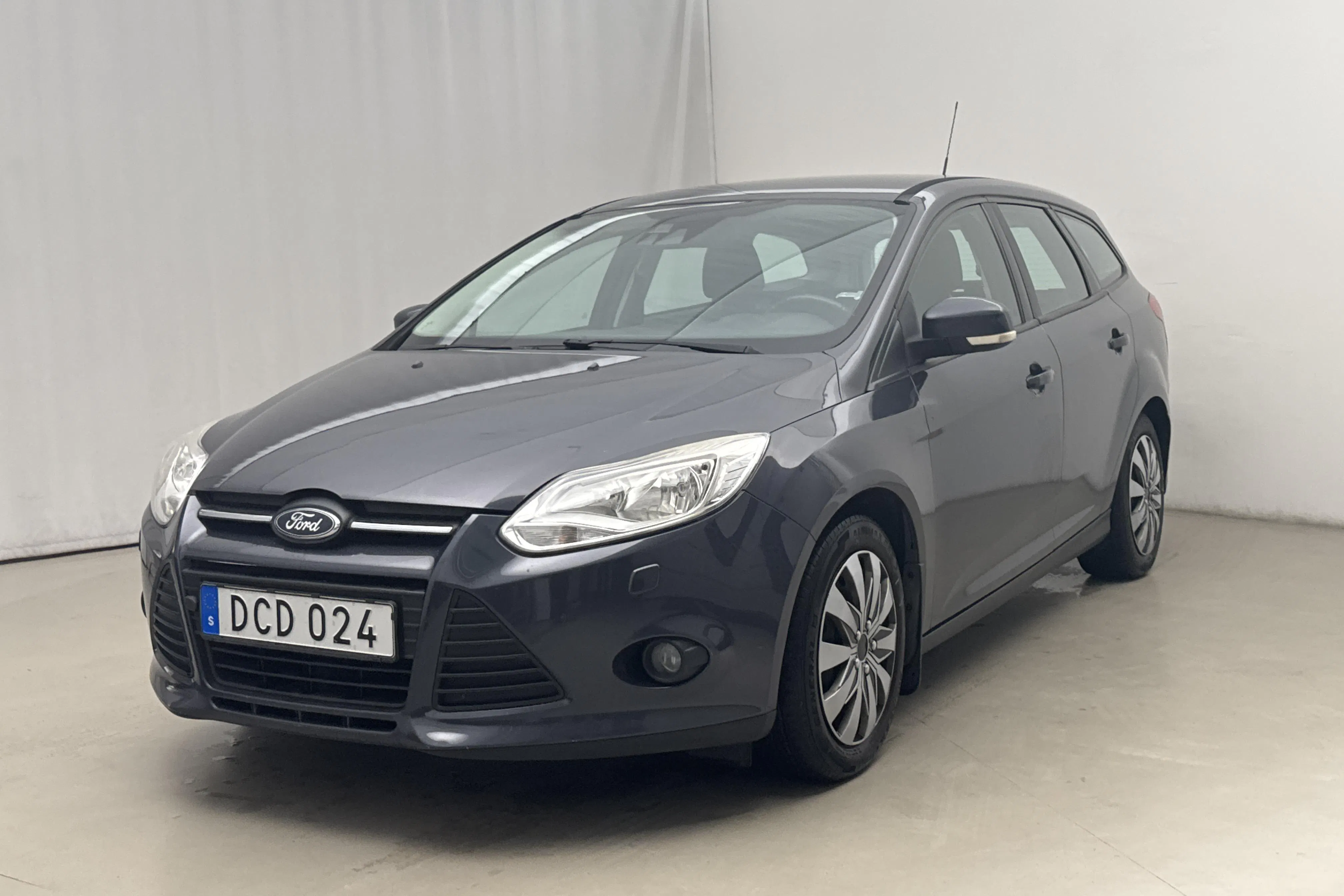 Presentationsfoto 1 av 14: Ford Focus 1.6 TDCi Kombi (95hk) - 17 147 mil - Manuell - grå - 2011