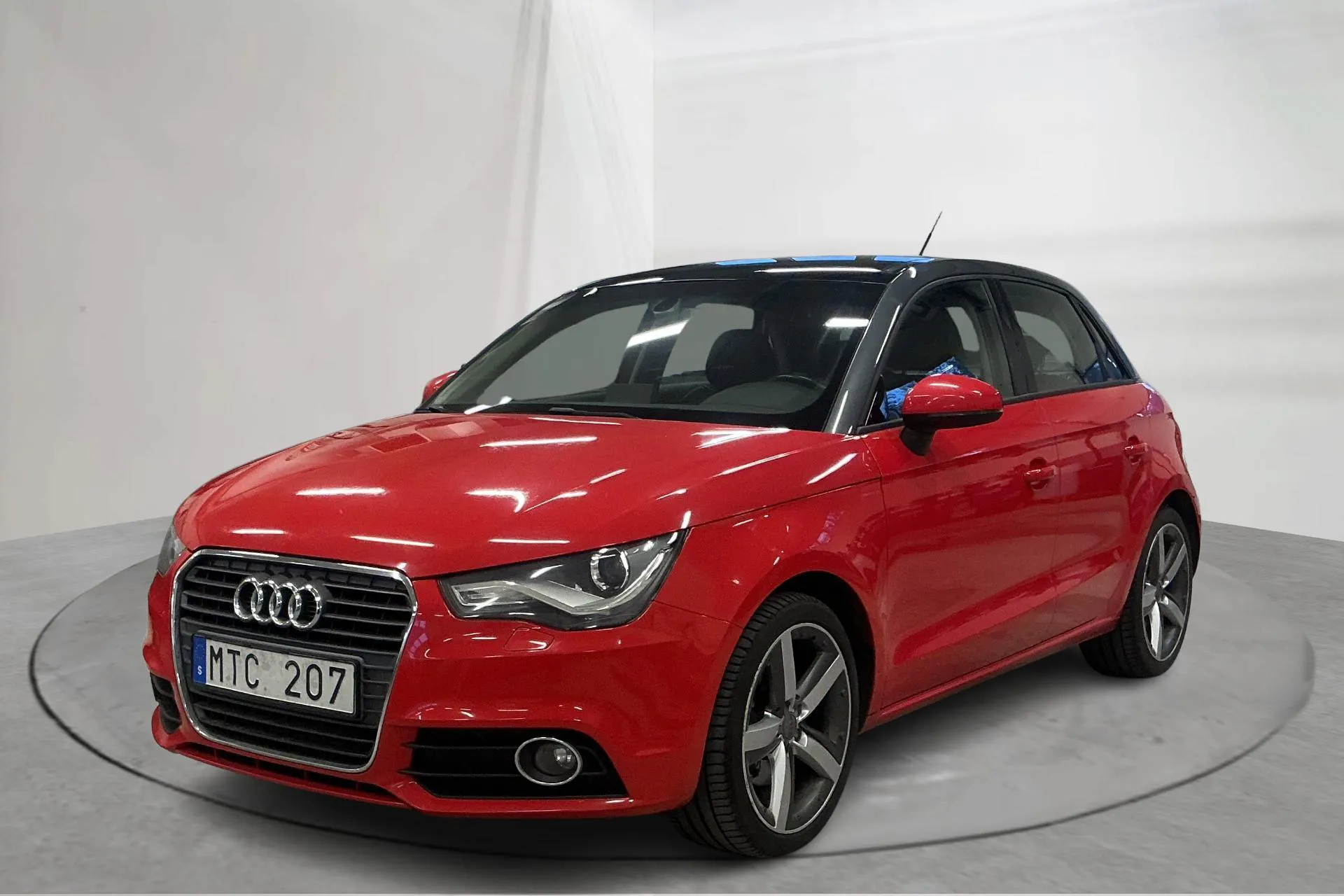 Presentationsfoto 1 av 14: Audi A1 1.6 TDI Sportback (105hk) - 19 260 mil - Manuell - röd - 2013