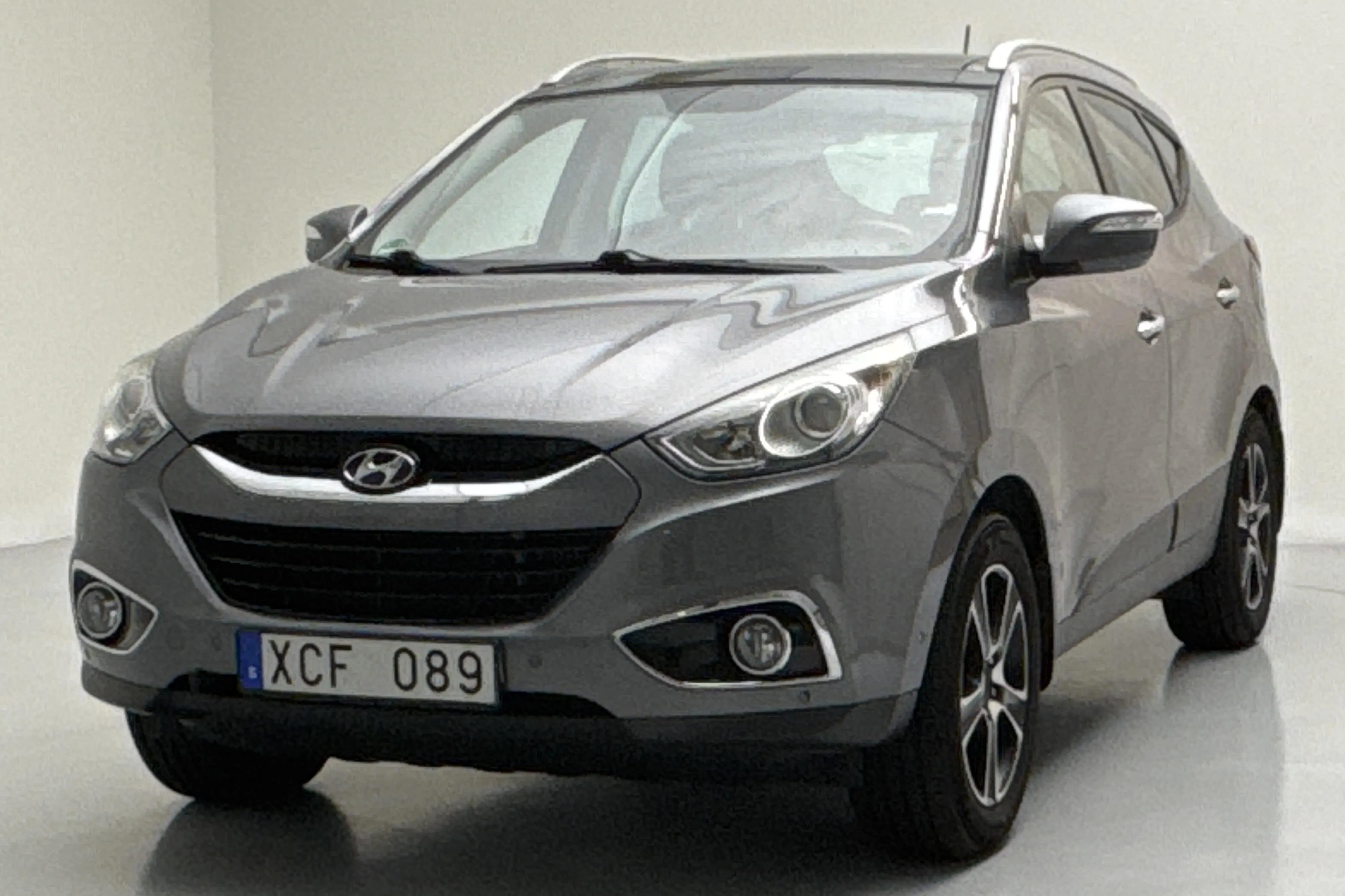 Presentationsfoto 1 av 15: Hyundai ix35 2.0 CRDi-R 4WD (184hk) - 16 251 mil - Manuell - grå - 2012